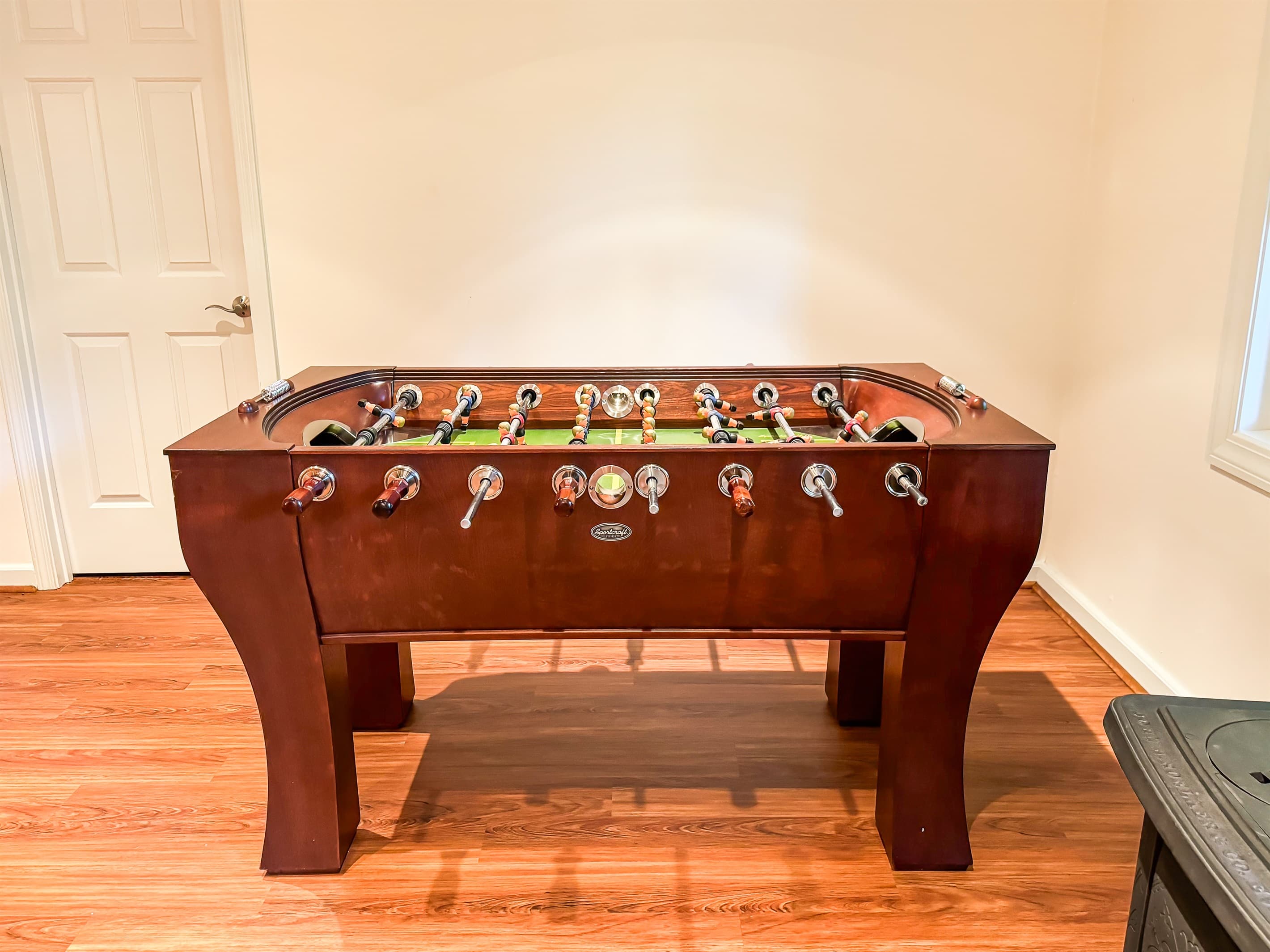 Foosball Table for all the family game night competition in the lower level entertainment room at Pointer Haus.