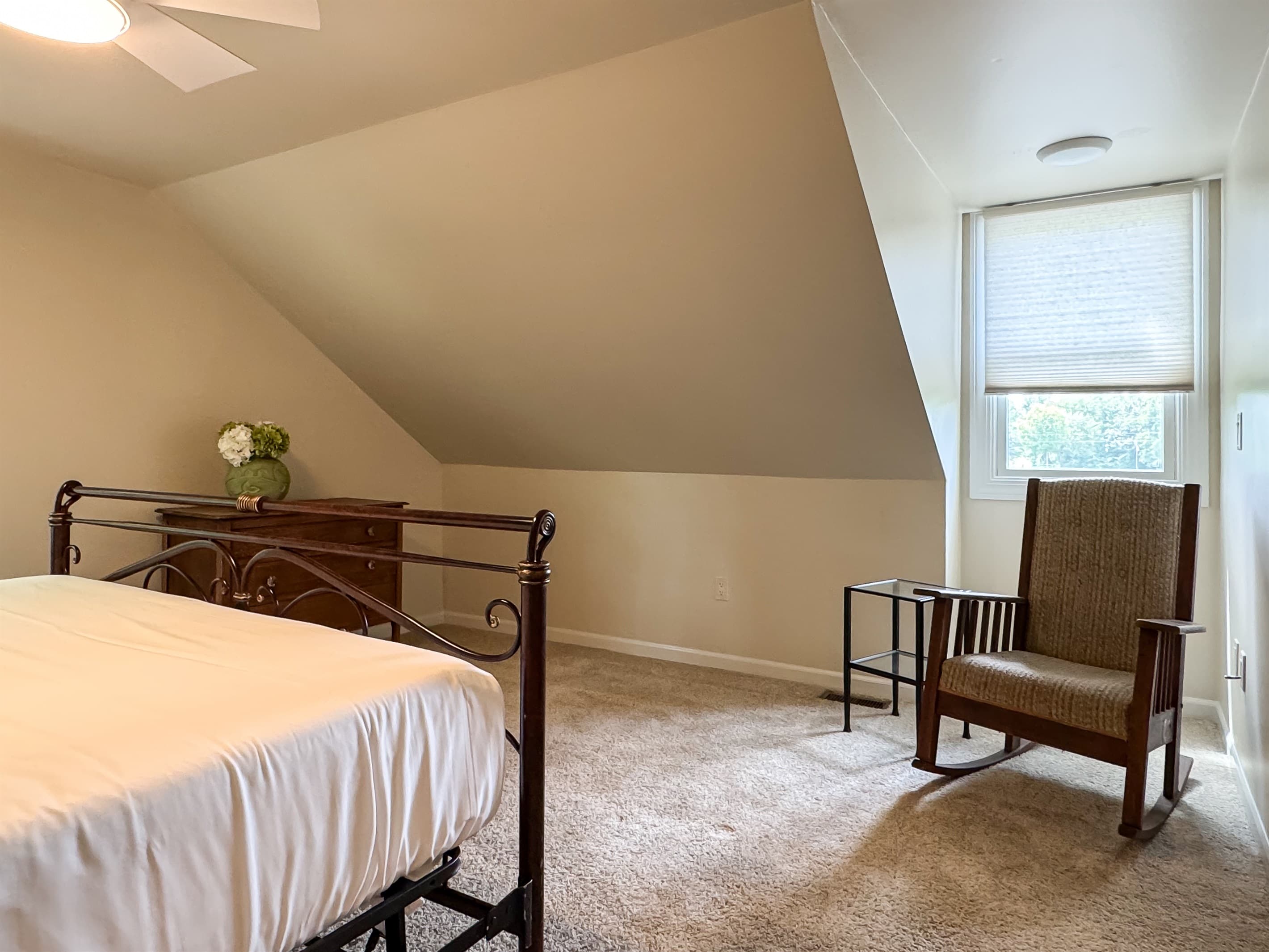 Large bedroom 5 upper level plush King Bed with comfy rocking chair to enjoy the morning sunny views at Pointer Haus.