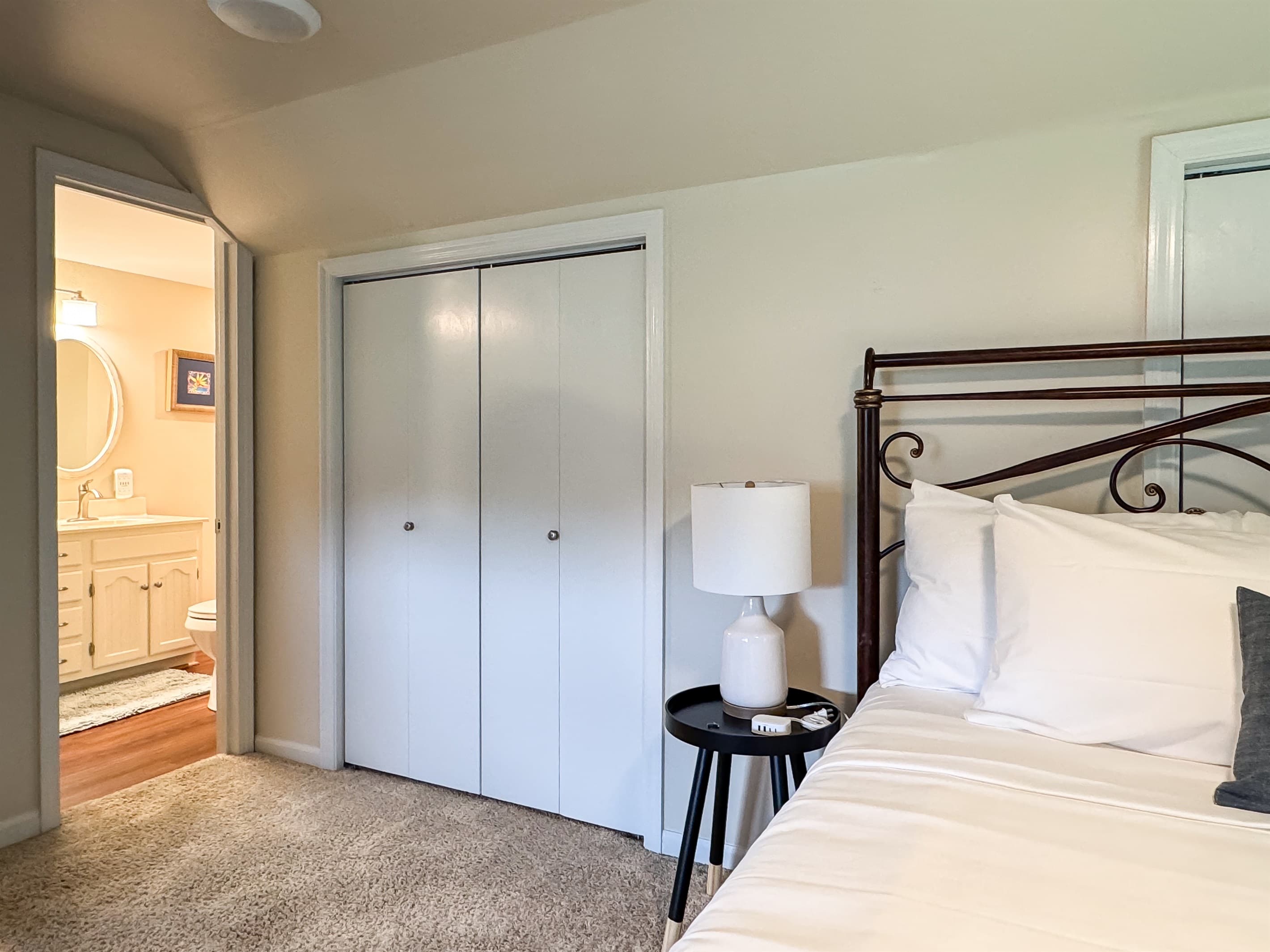 Bedroom 5 (upper level) with King Bed with large closet and Jack and Jill Bathroom with tub/shower combo at Pointer Haus.