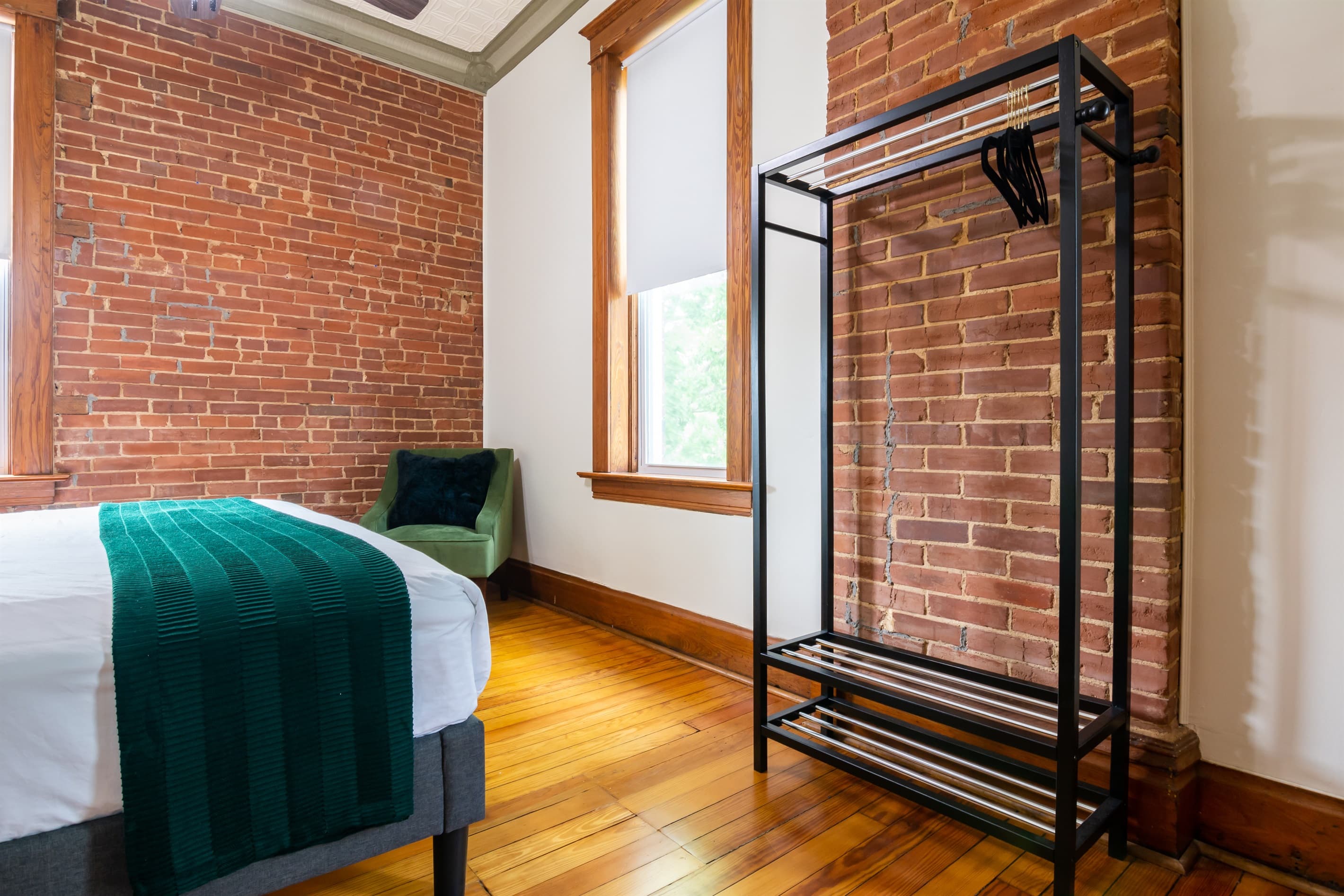 Upper level bedroom with ample space, king size bed, and ensuite bathroom at the the Bank Haus.