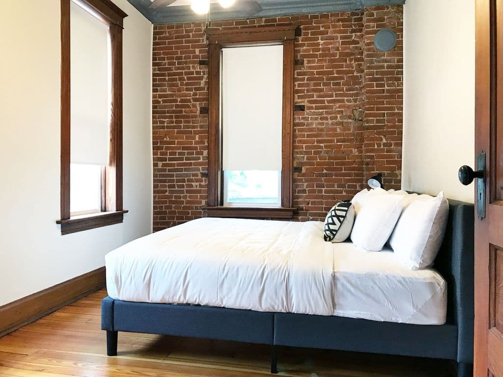 Bright and spacious upper level bedroom with cozy king size bed.
