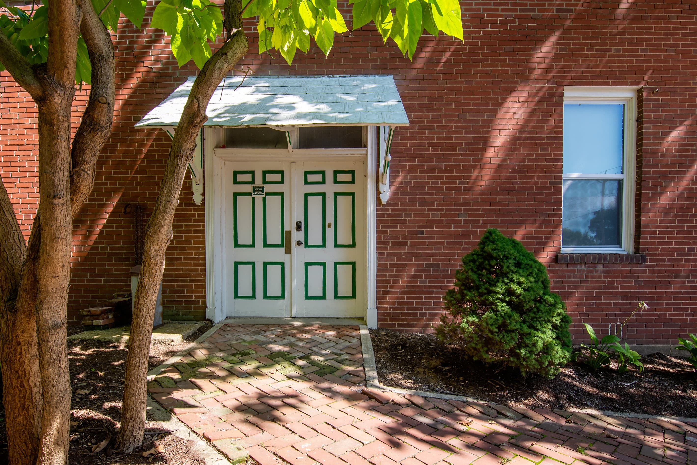 Main entry door on the side of the Bank Haus.