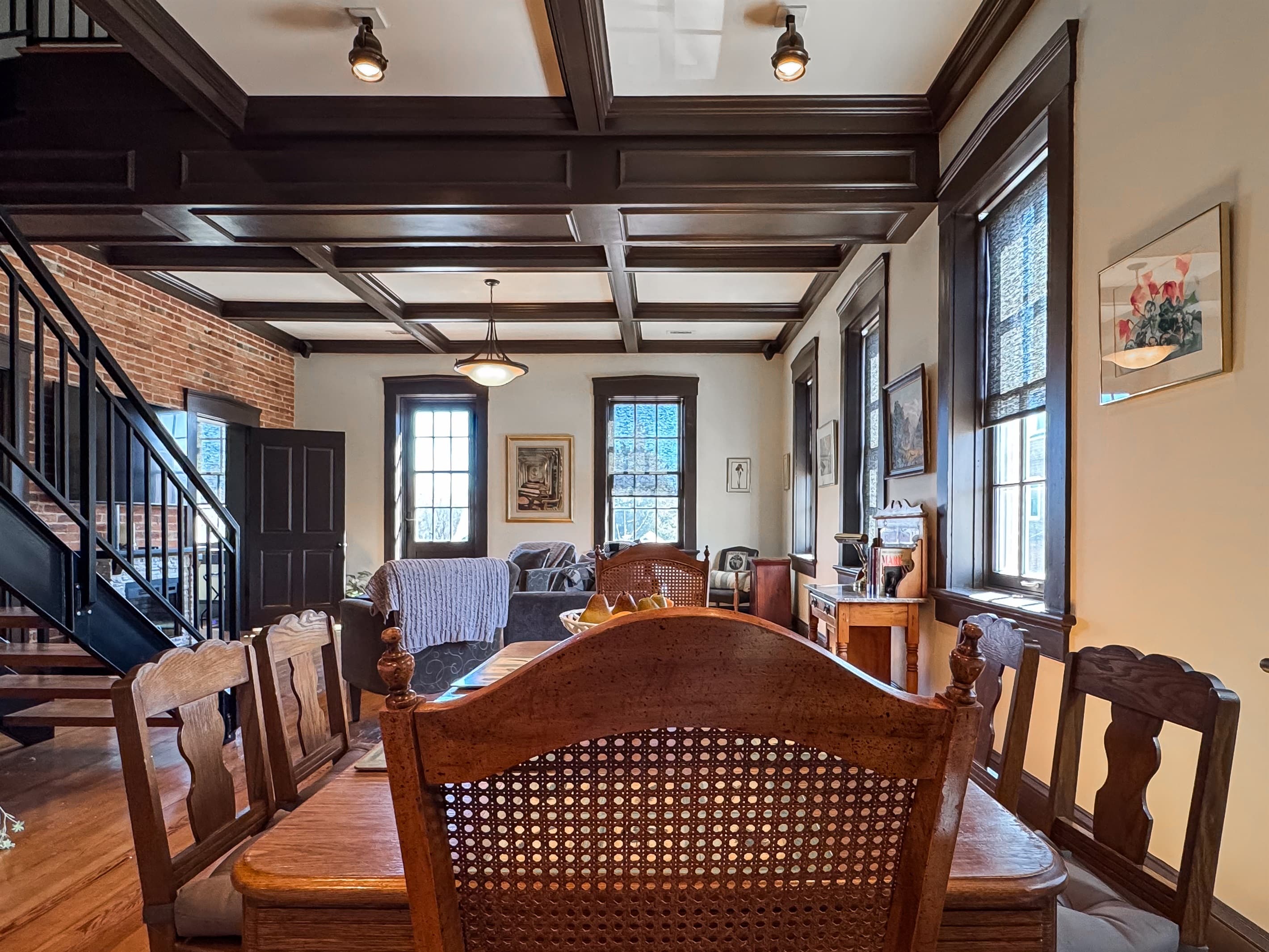 Dining table area made for families/groups to enjoy dinners and game night to escape the busy days of life at Tamm Loft in downtown Washington, MO.
