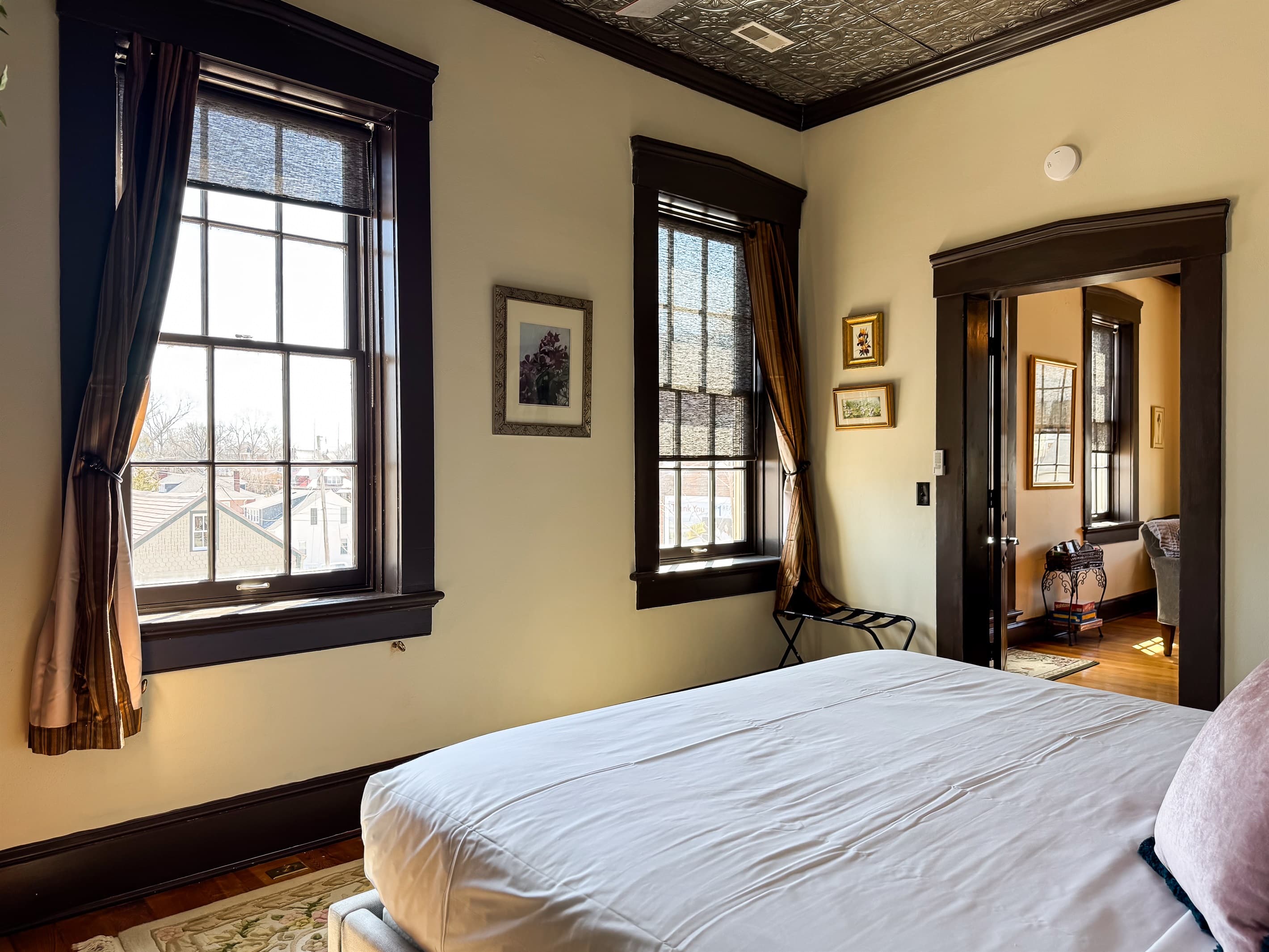 Main level warm and inviting plush King Bedroom with views of the historic town in Washington, Missouri at Tamm Loft.