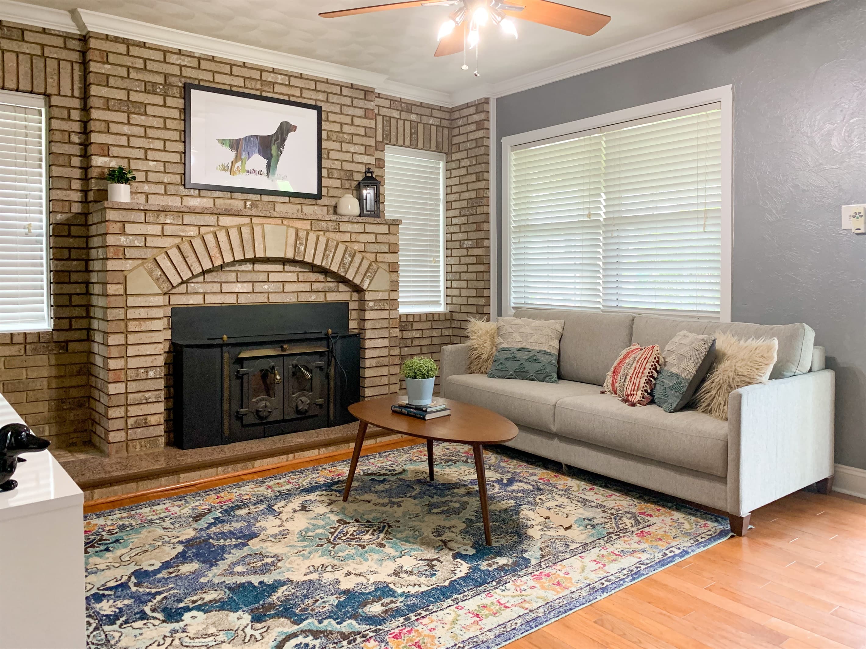 Bright and airy main level living area with smart TV and king sleeper sofa at Setter Haus.