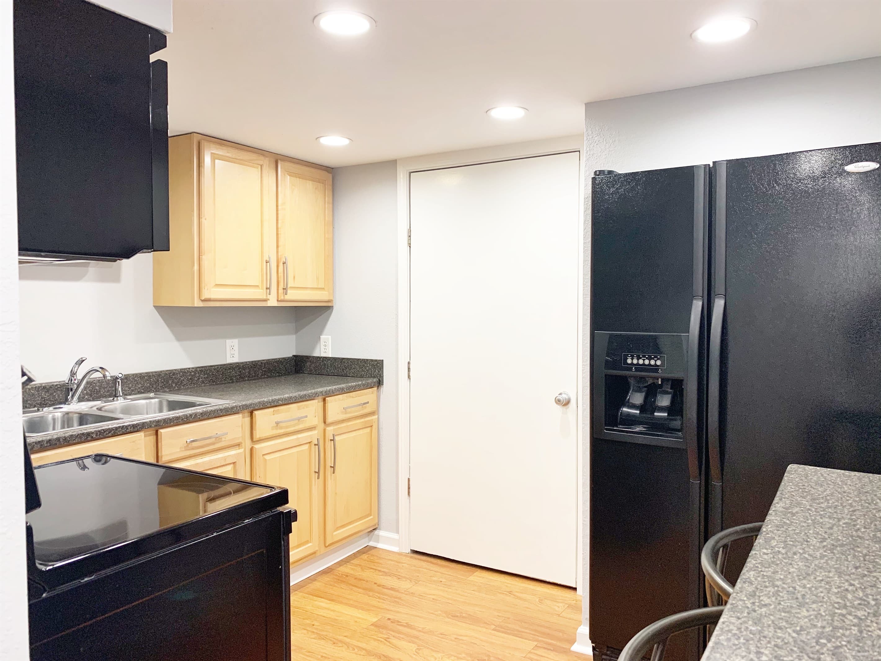 Lower level small kitchen with extra fridge