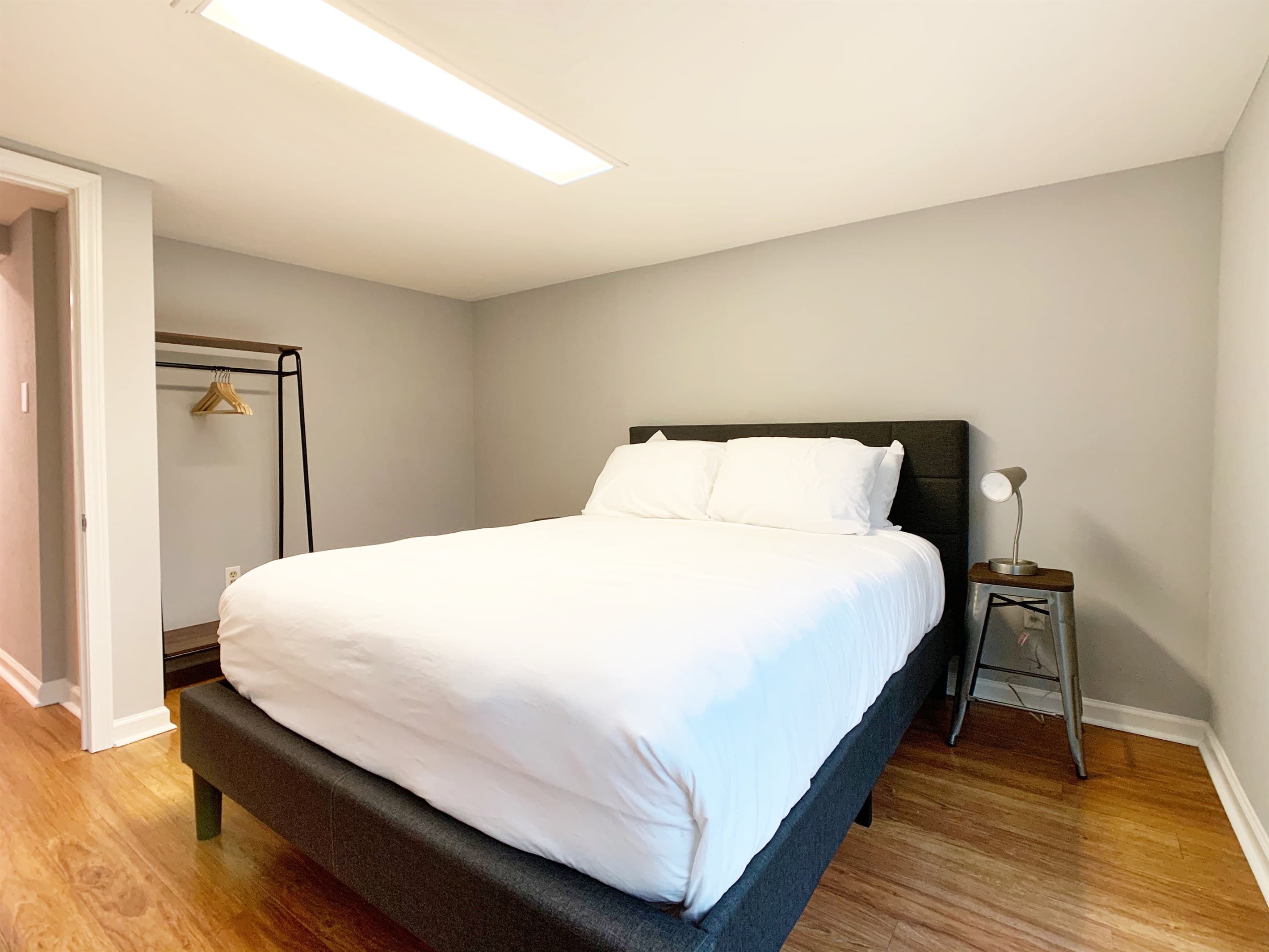 Lower level bedroom 3 with queen bed