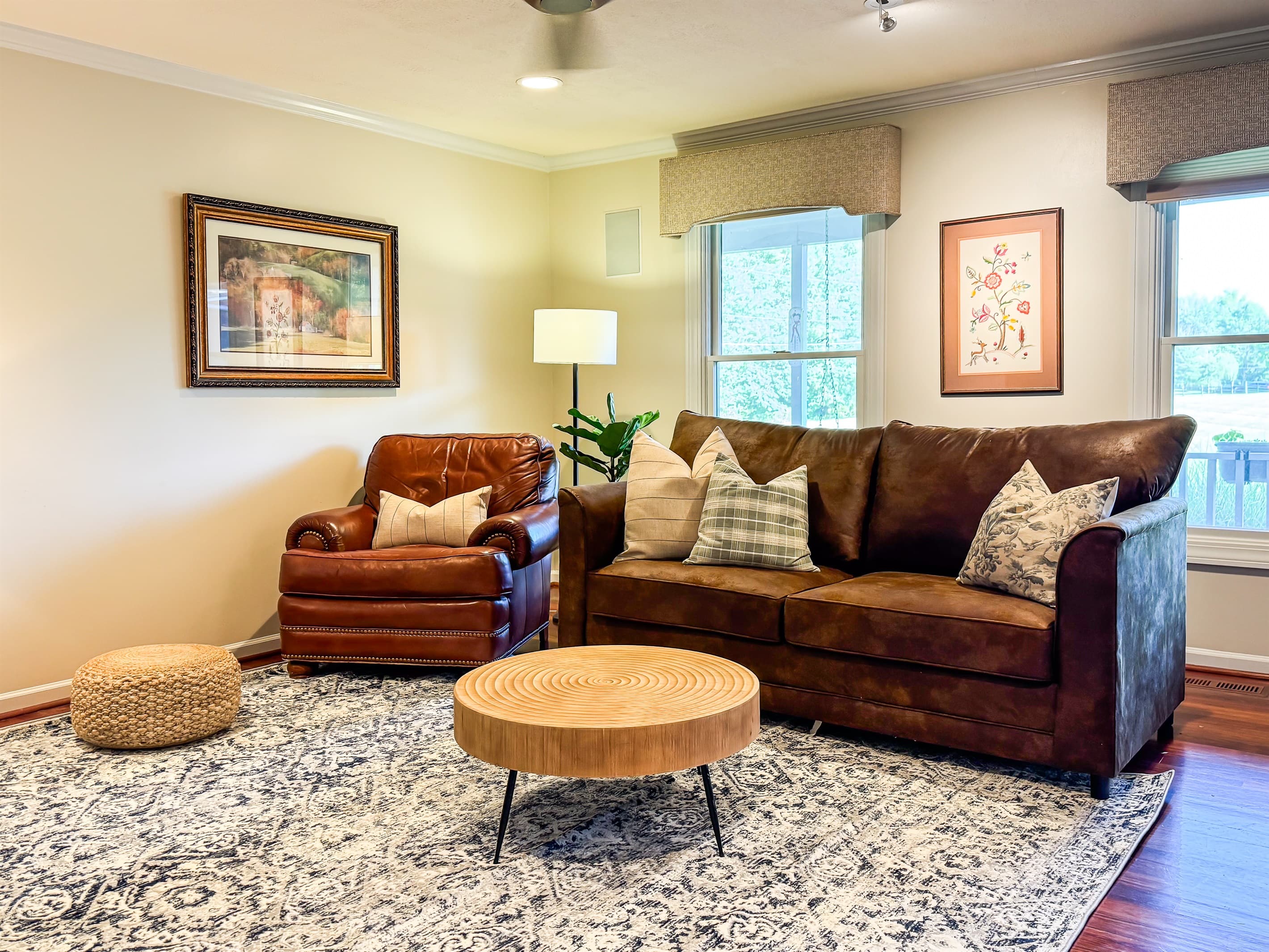 Large great room with comfortable furniture including a sofa sleeper to watch movies at Pointer Haus.