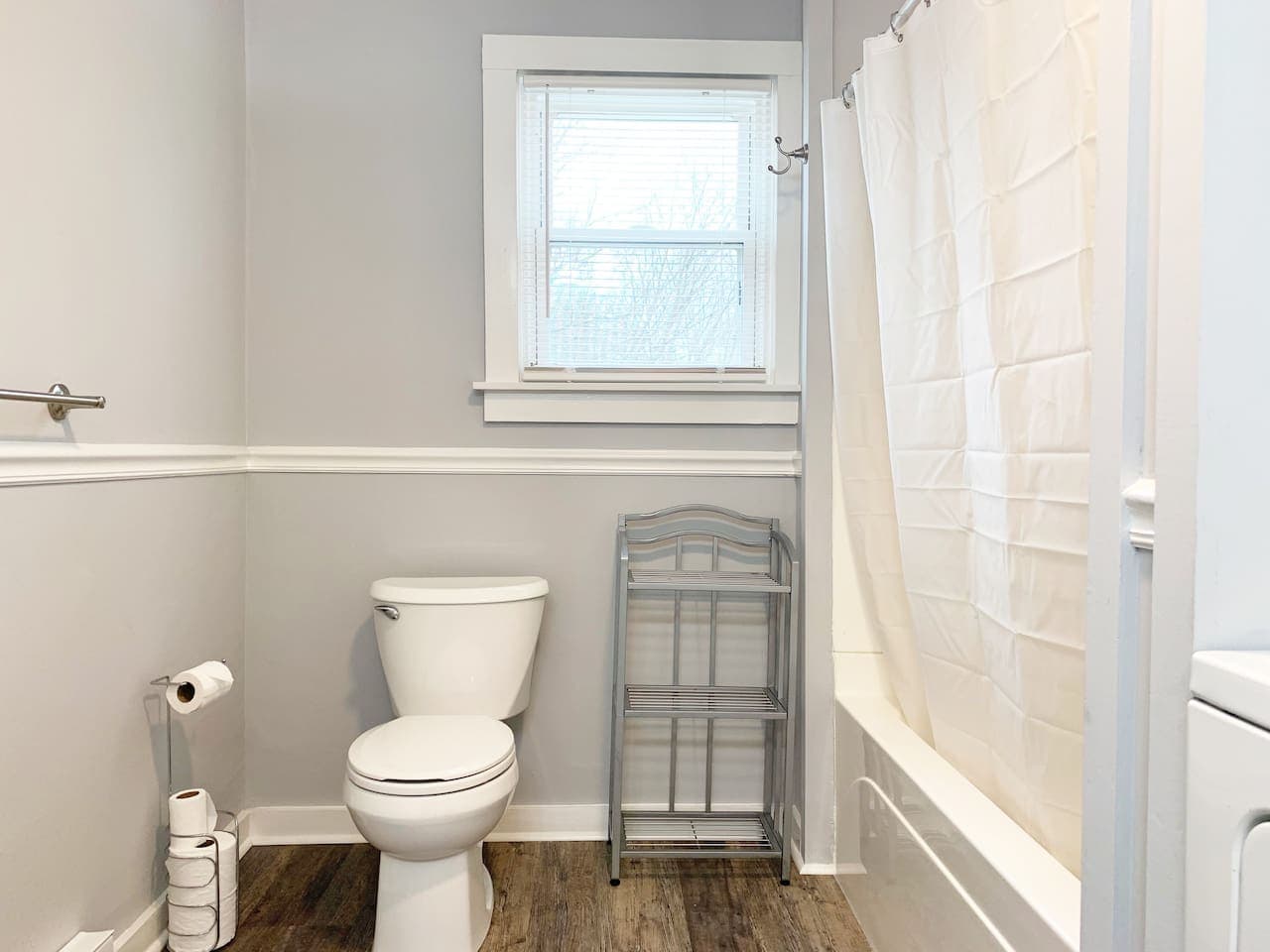 Spacious bathroom with shower/tub combo.