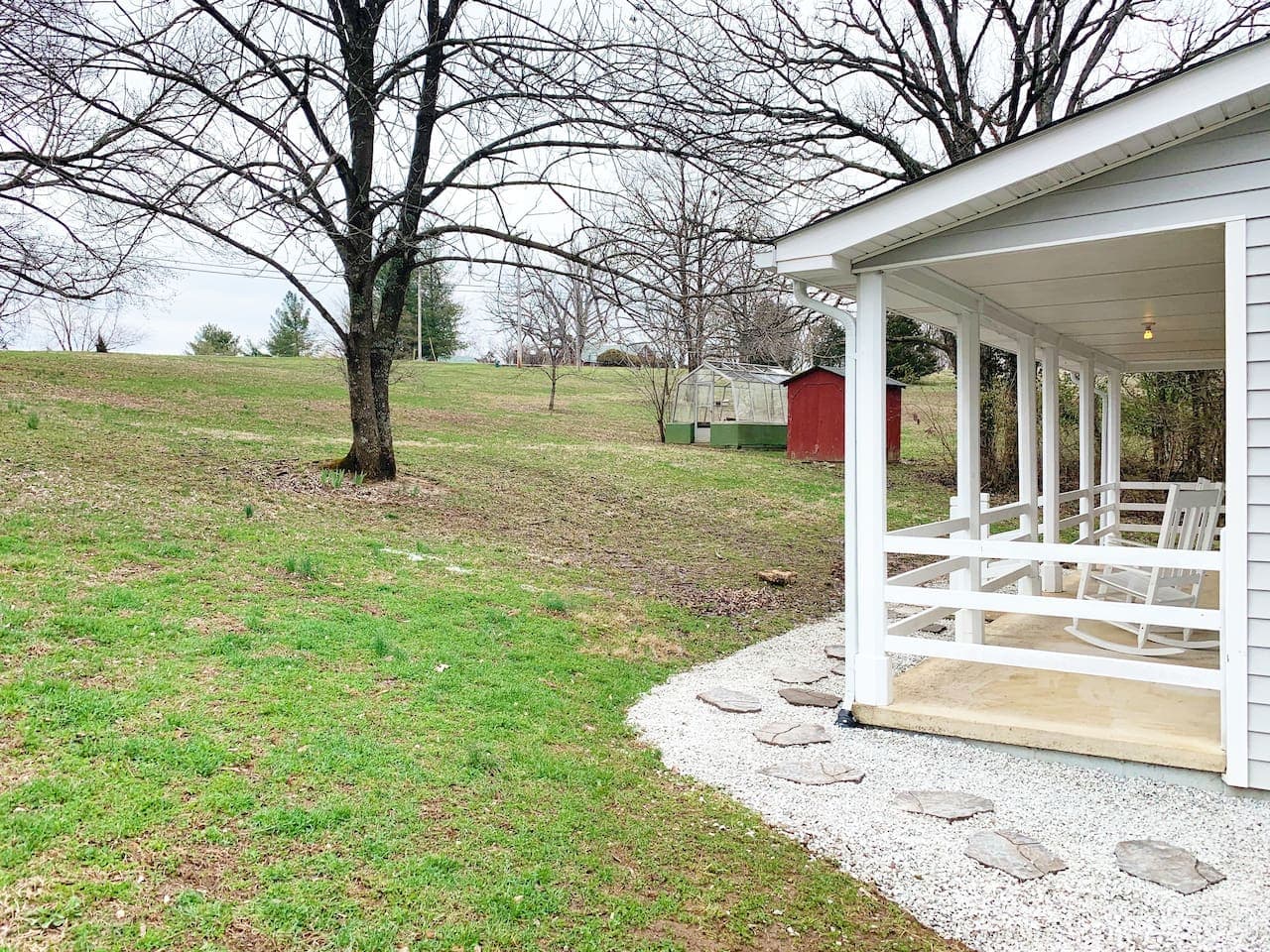 Large outdoor space for doggies and a front porch with seating area to relax.