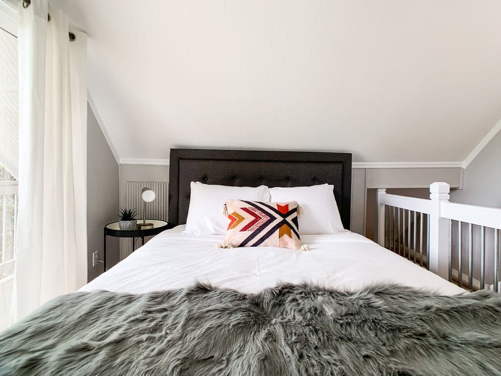Soft and cozy queen bed in the upstairs loft at the Hound Haus.