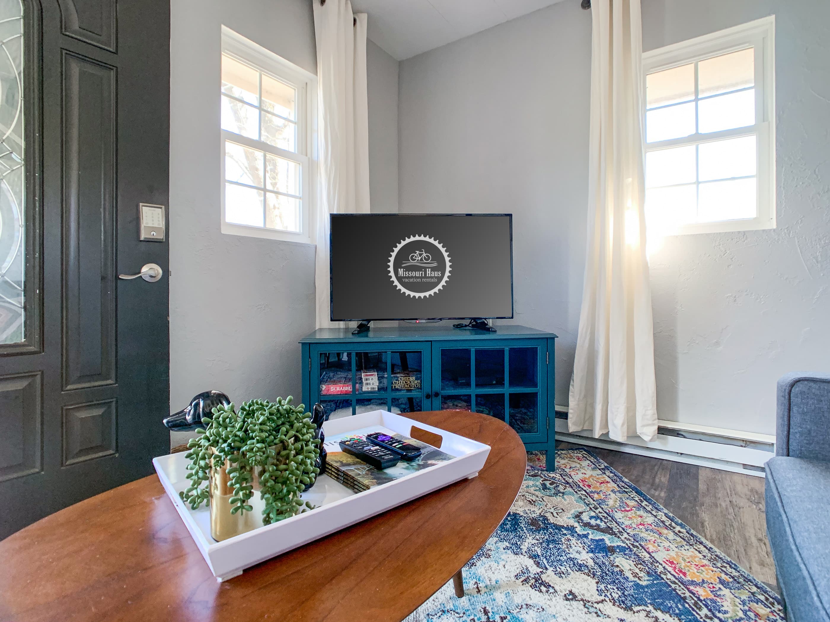 Comfy small living area with a smart TV at the Hound Haus.