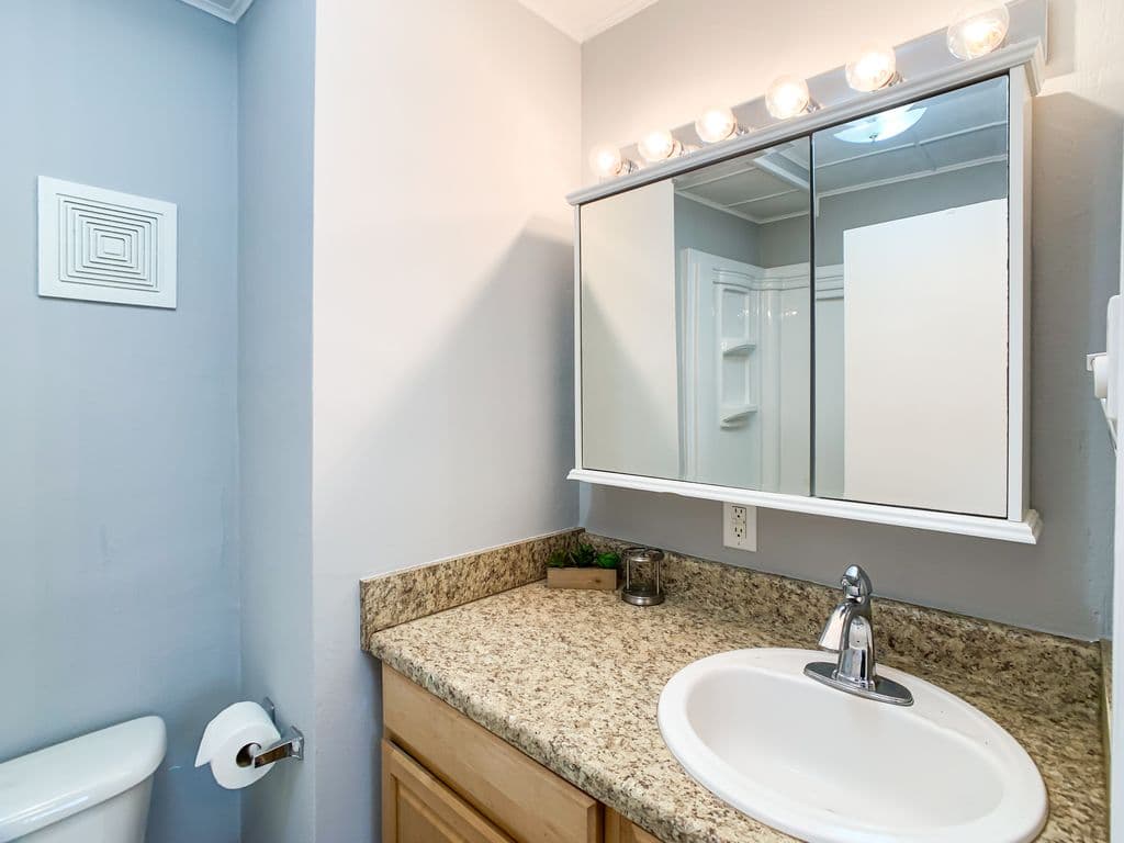 Full size bathroom with low entry shower.