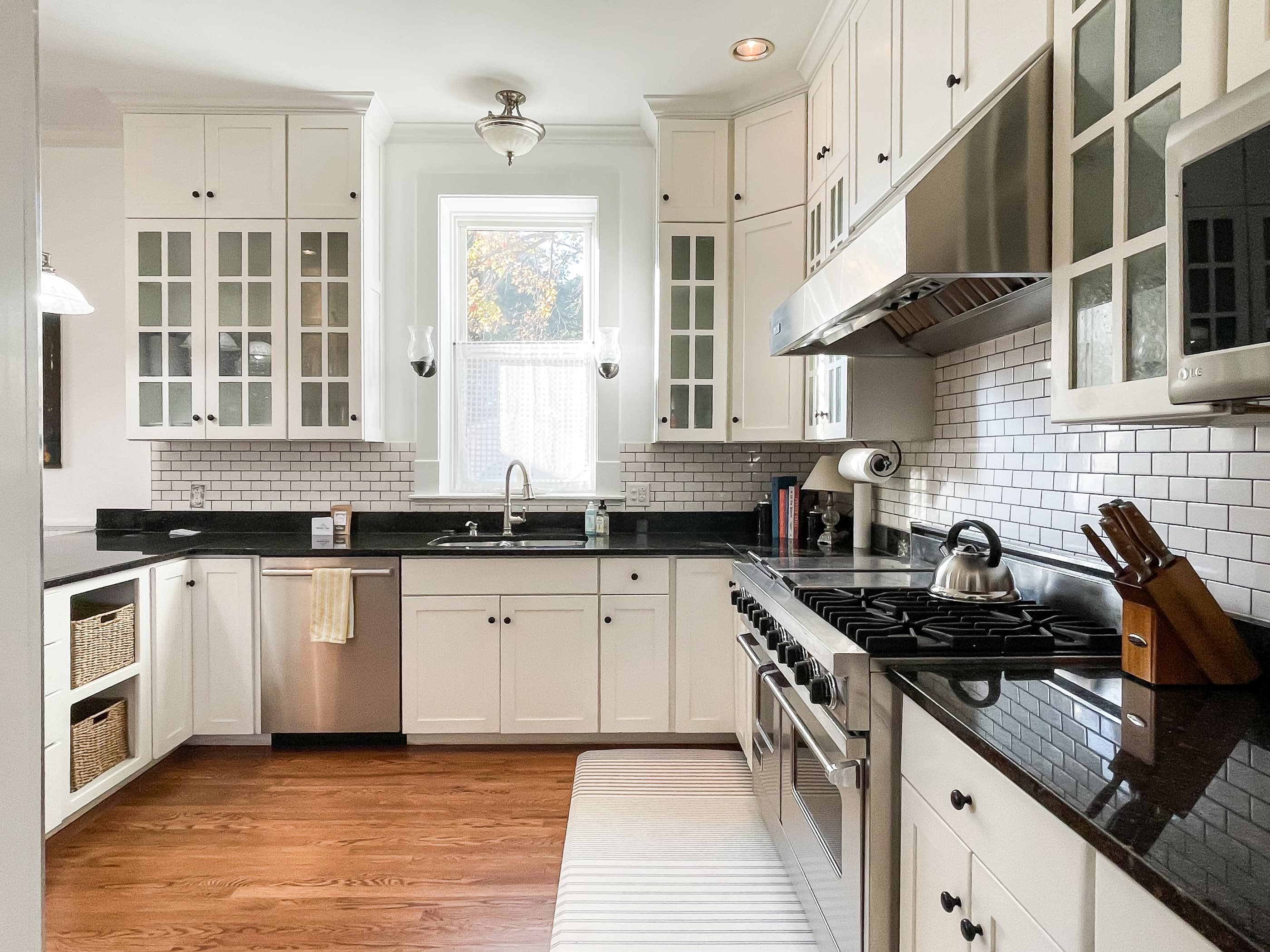The beautifully detailed full kitchen has everything you need to make your own meals, including modern appliances, place settings, pots and pans, wine glasses, and a stove top griddle for those family breakfast pancake at Mill Haus.