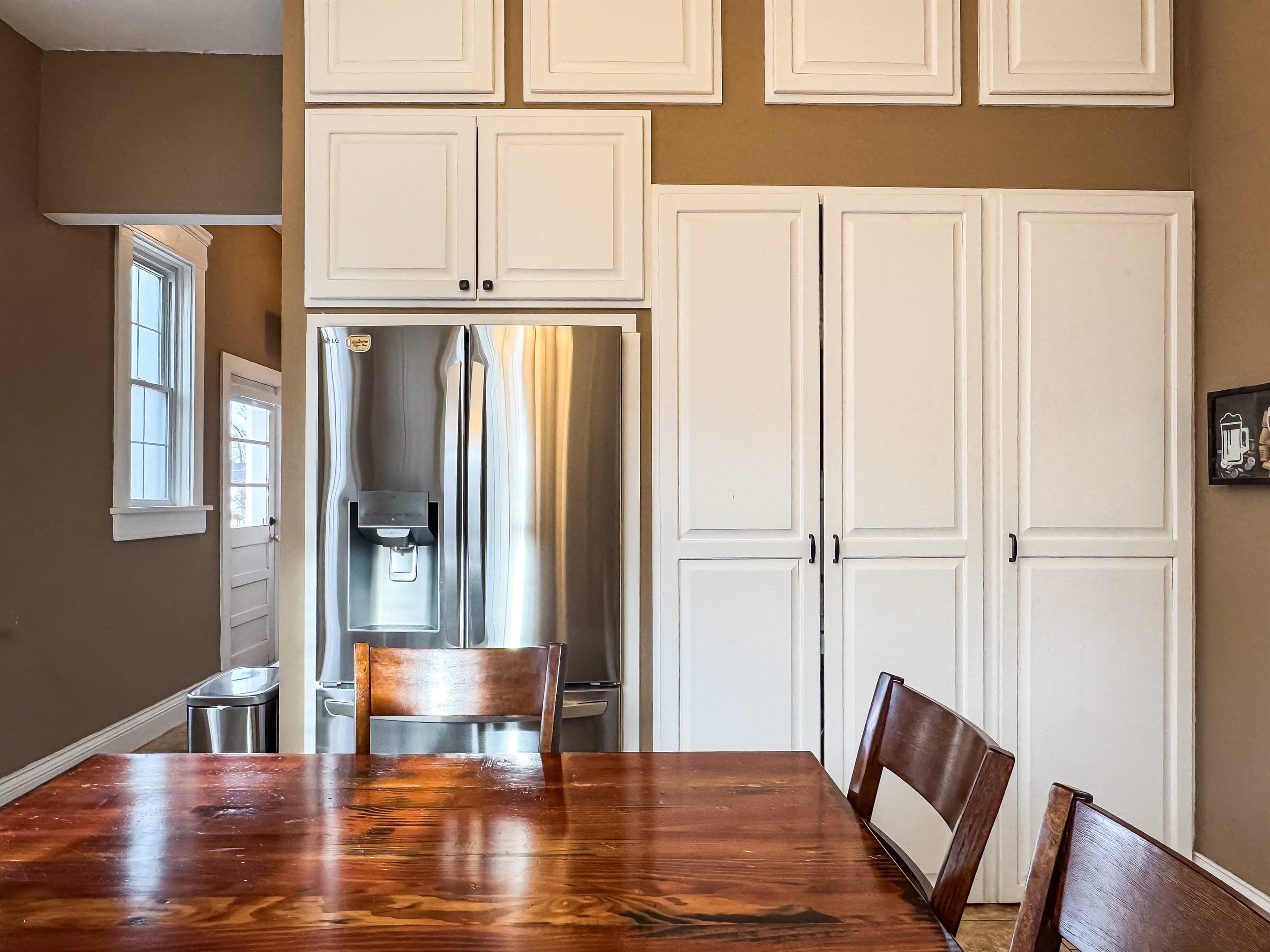 The spacious kitchen has all new appliances and everything you need,  to feel like home at Aussie Cottage.