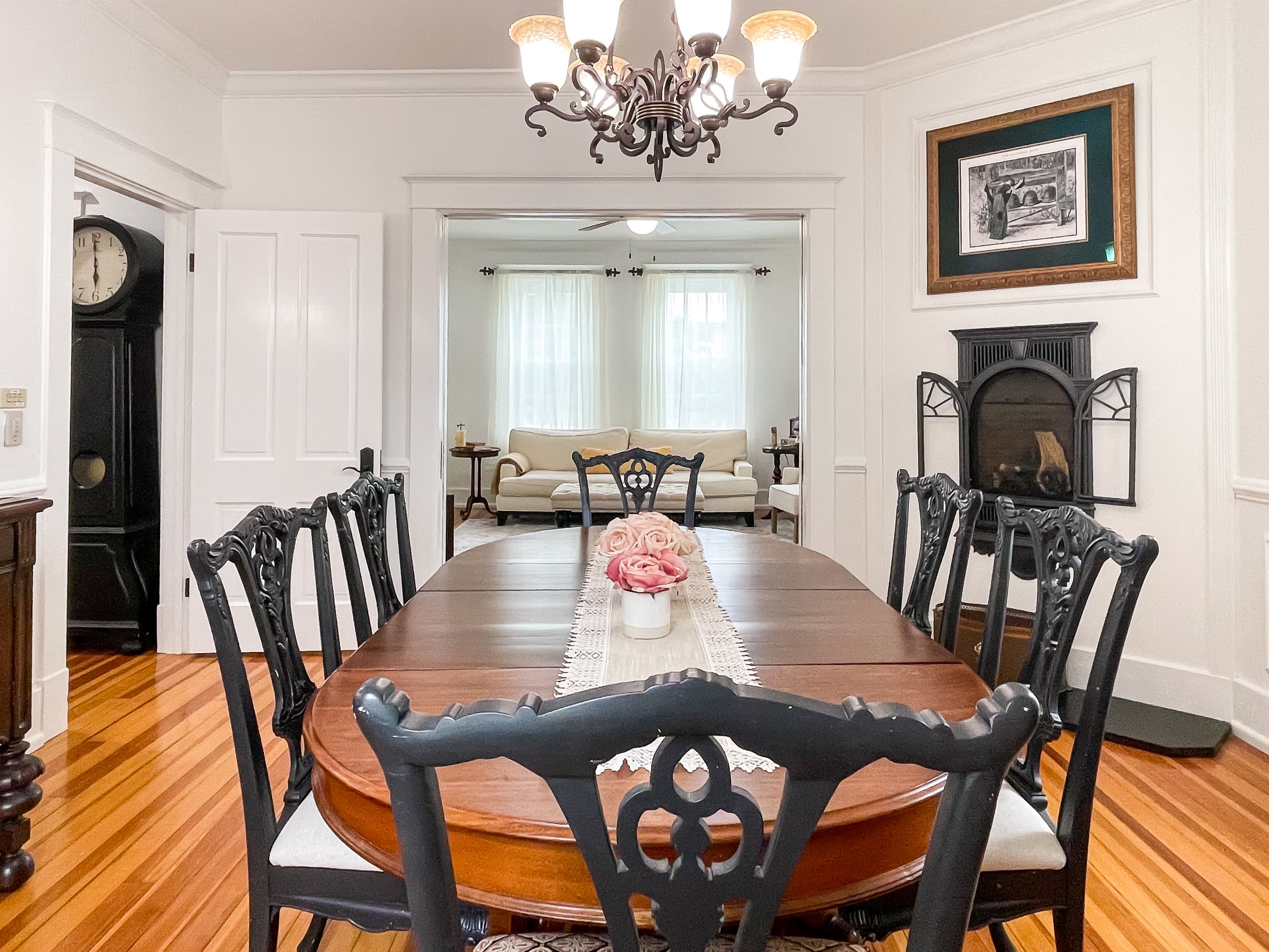 The large dining area includes a gorgeous hardwood dining table and seating for 6 people for family dinners or game night at The Beekeeper's Cottage.