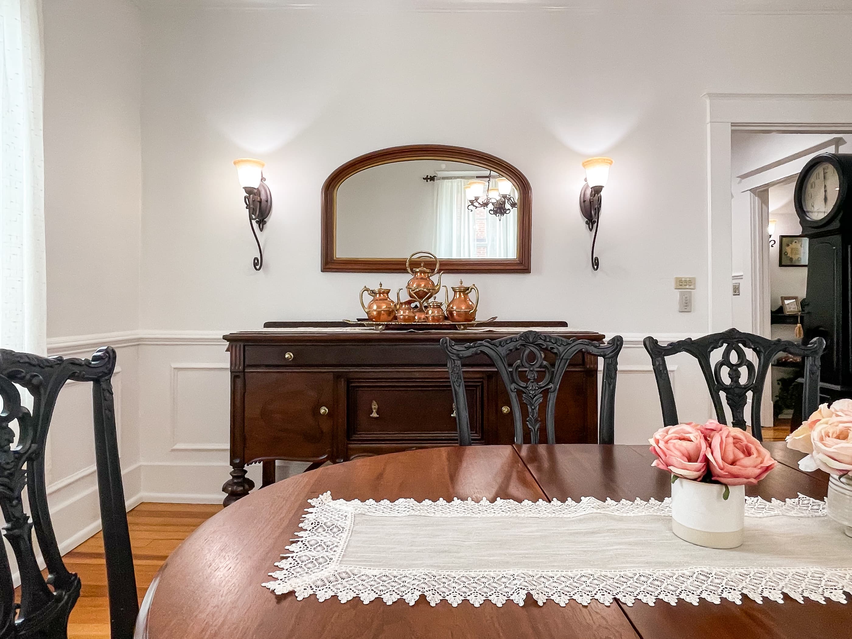 The large dining area includes a gorgeous hardwood dining table and seating for 6 people for family dinners or game night at The Beekeeper's Cottage.
