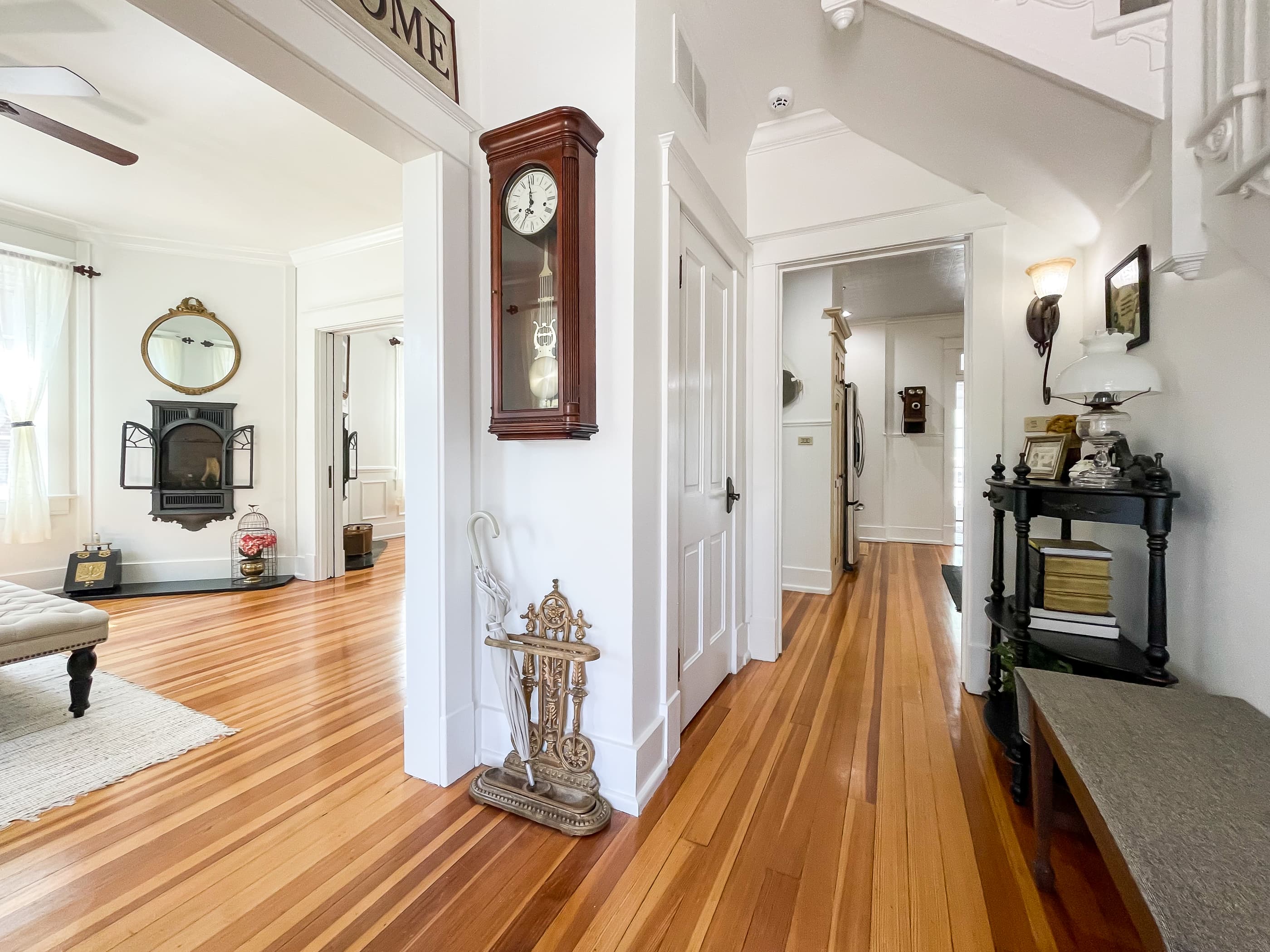 Entrance to the historic Beekeeper's Cottage over a century old, the fireplaces (nonworking), doors, woodwork, and hardwood floors have been refurbished, adding a beautiful charm to this brick home.