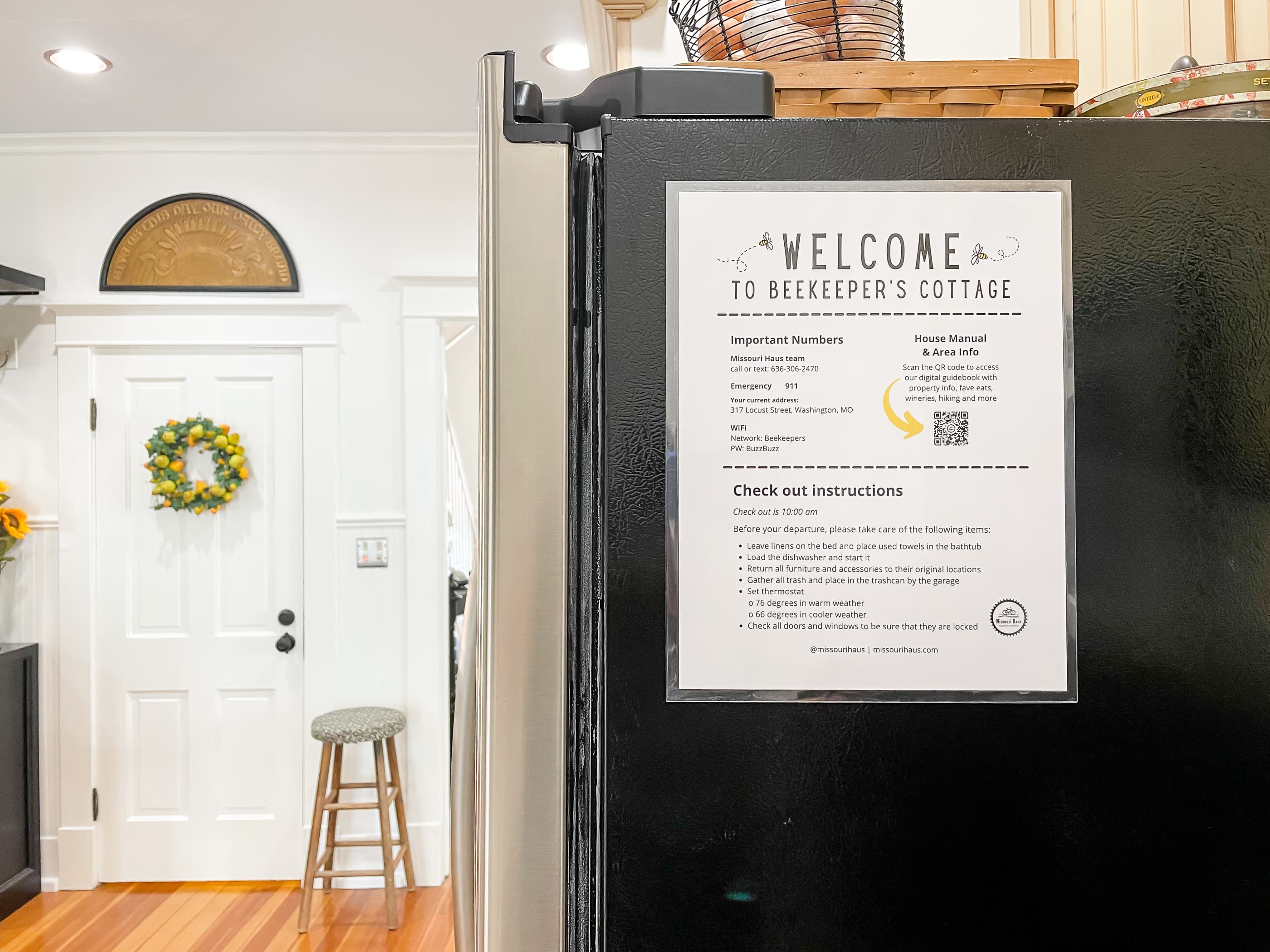 The beautifully detailed full kitchen with modern amenities to enjoy prepping meals for your family/coworkers/friends and eclectic lighting made from wine bottles at The Beekeeper' Cottage.