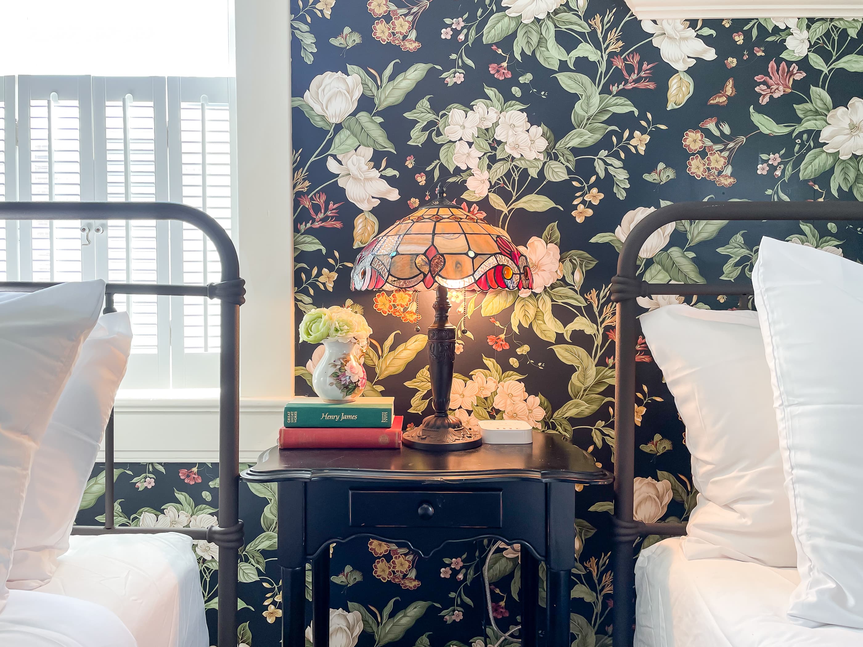 Large roomy bedroom 2 has two queen size beds with crisp white linens and share the second full bathroom in the hallway that includes a gorgeous clawfoot tub. 
