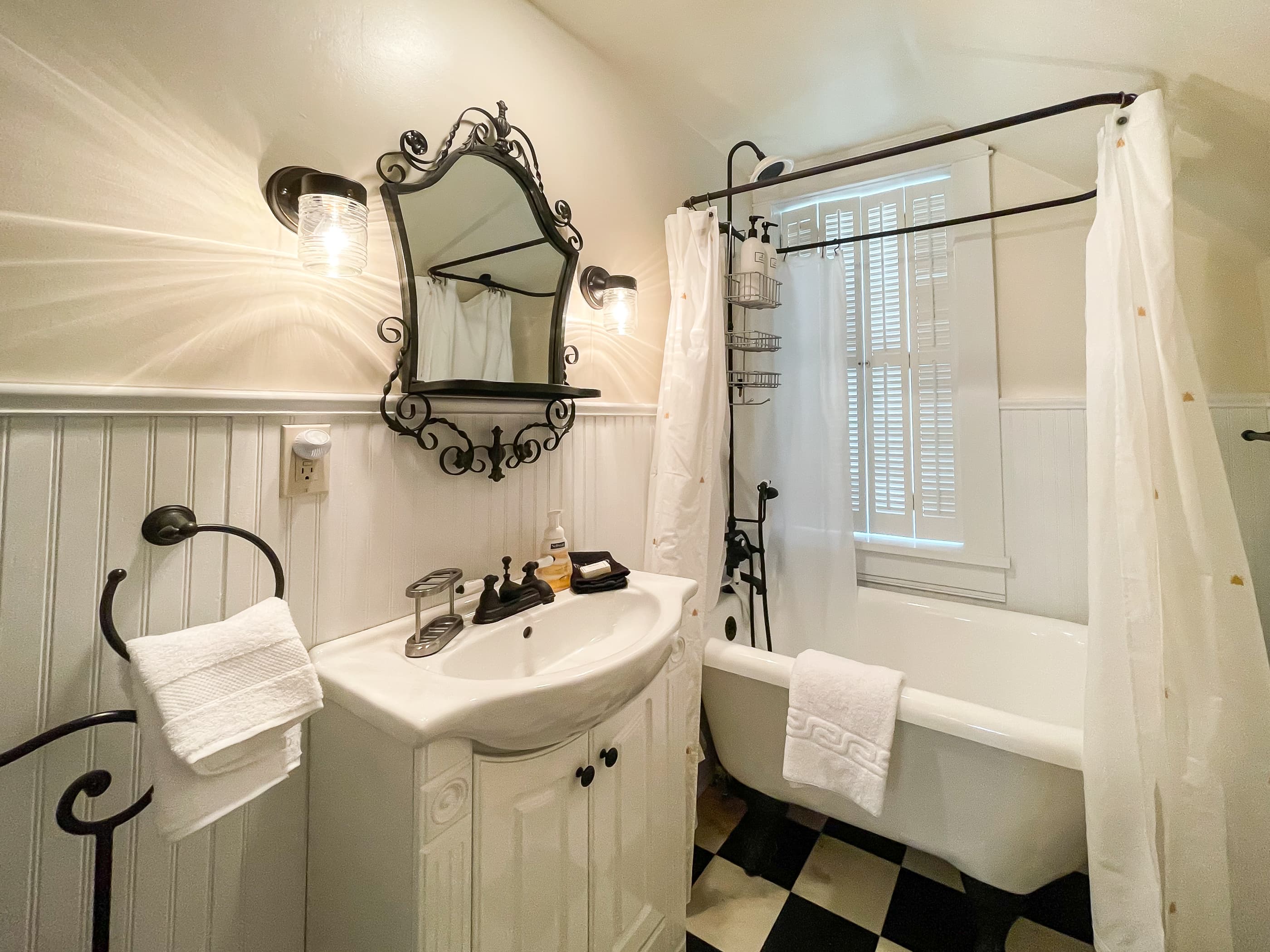 Upper level 2nd full Bathroom with gorgeous clawfoot tub at The Beekeeper's Cottage.