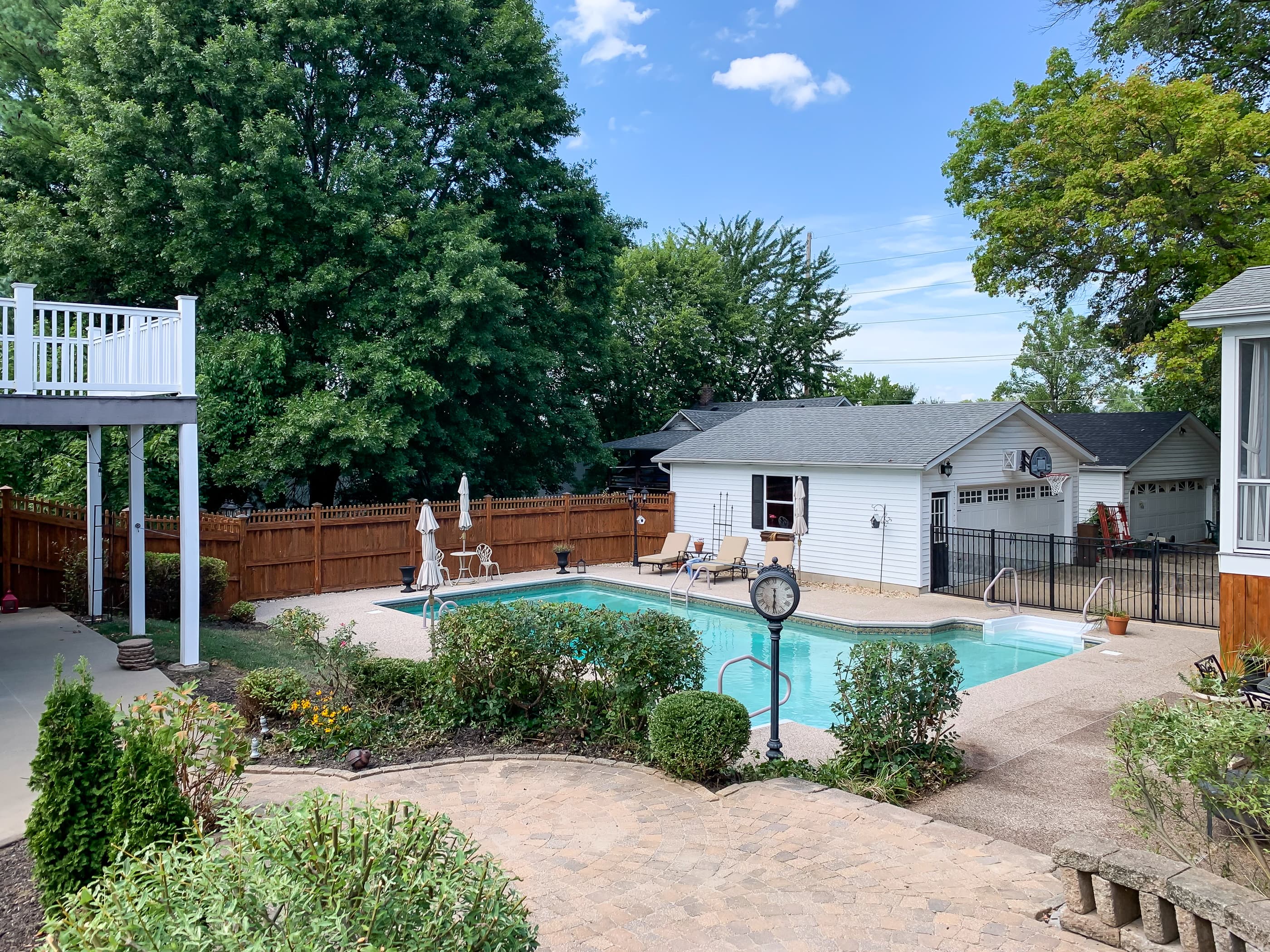 This Beekeepers Cottage big backyard and spectacular swimming pool is shared with the Mill Haus next door (shown in the photo) -- Pool is open approximately mid-April through October (depending on weather).