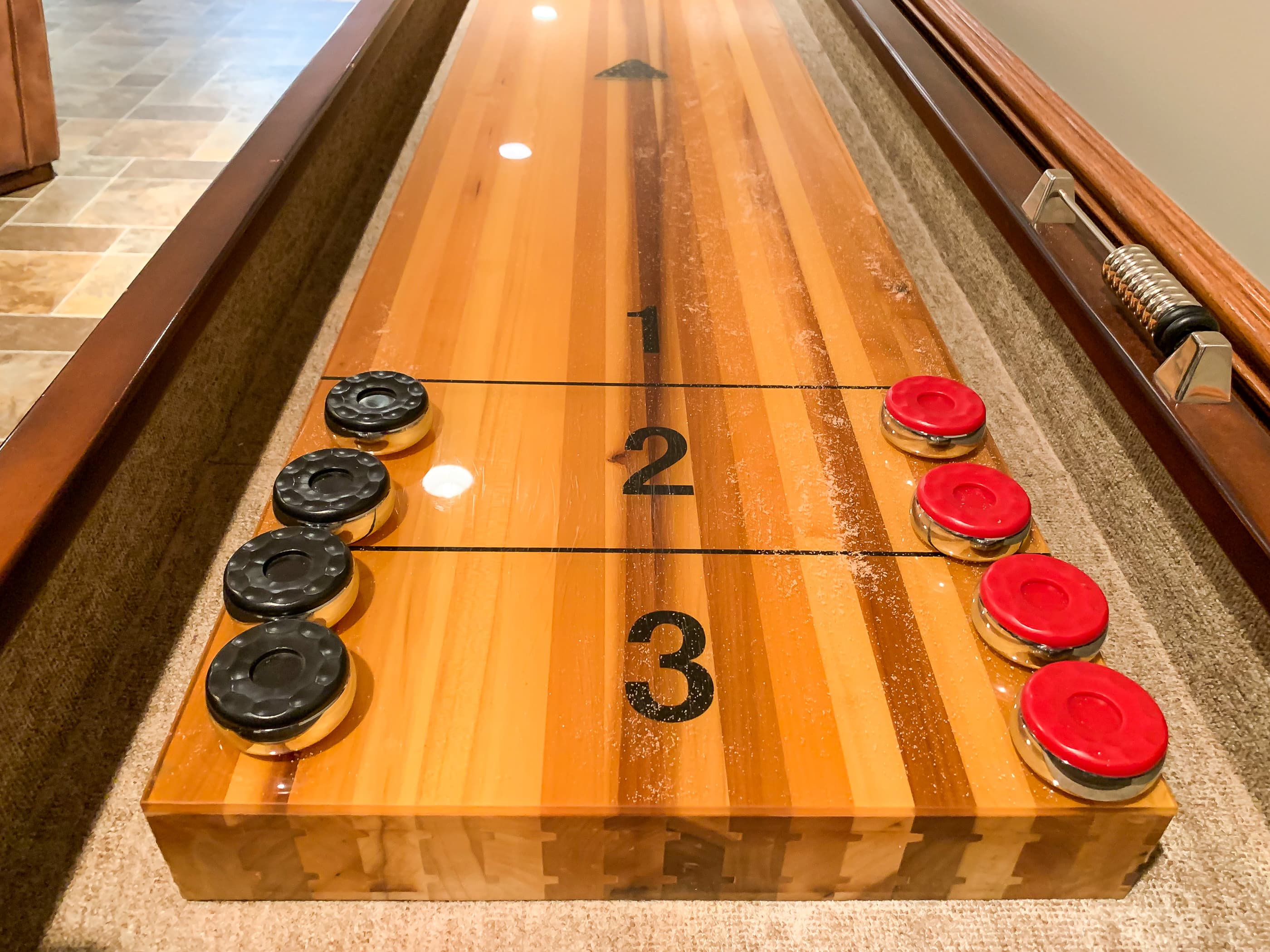 OPTIONAL ADD ON: Beekeepers Cottage Garage upper level game room with shuffle board, flat screen Smart TV and comfy leather furniture great for game or movie night with family and friends.