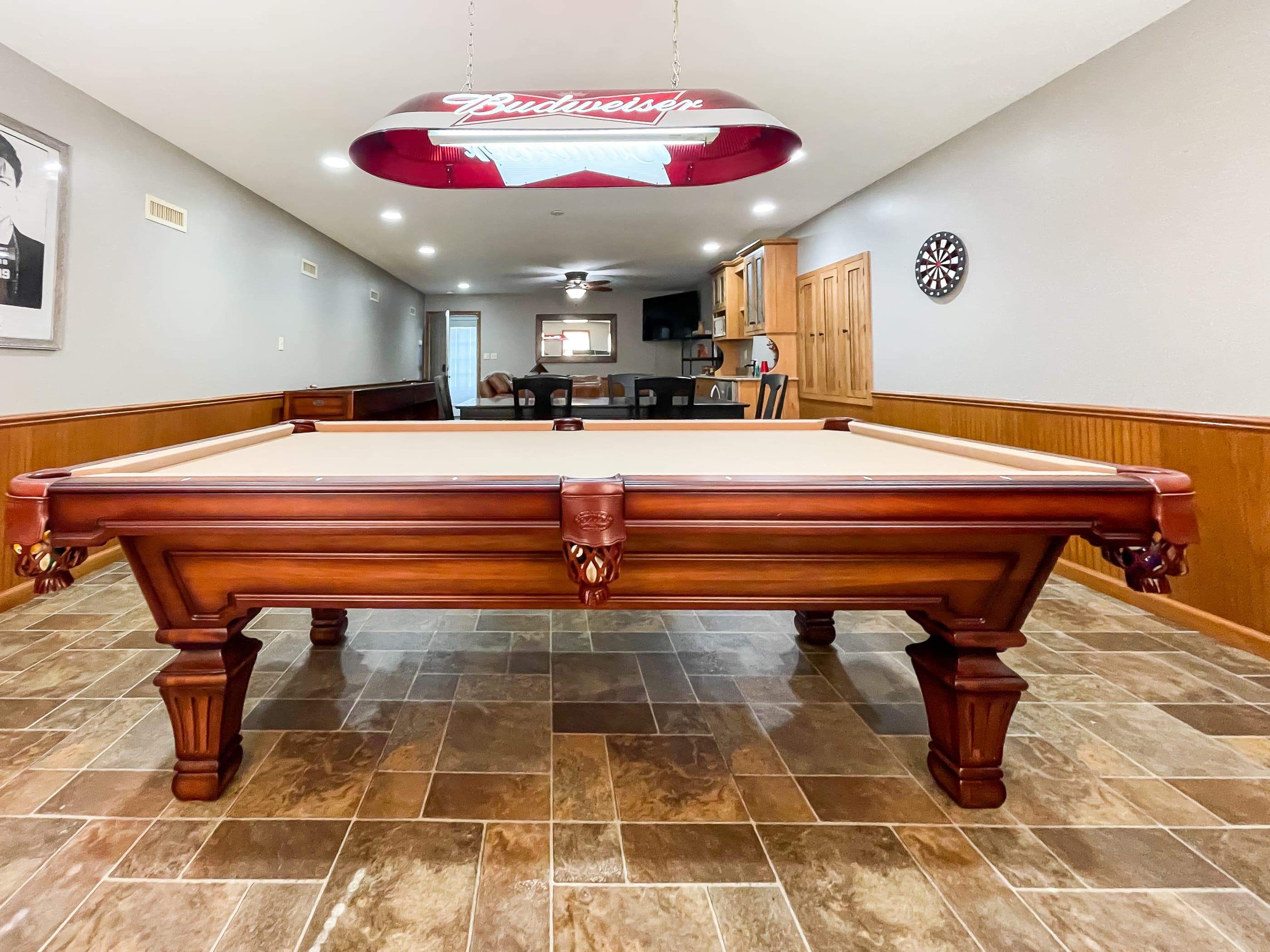 OPTIONAL ADD ON: Beekeepers Cottage Garage upper level game room with professional size pool table, shuffle board, flat screen Smart TV and comfy leather furniture great for game or movie night with family and friends.