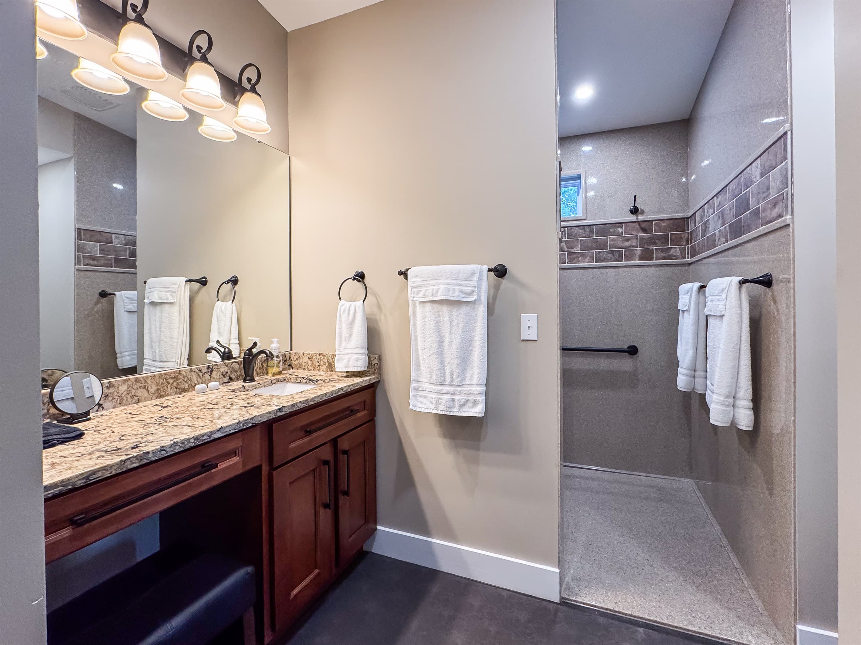Abundant counter space, towels, toothpaste, and a bar soap is supplied for each guest at Pike's Peak Schoolhouse.