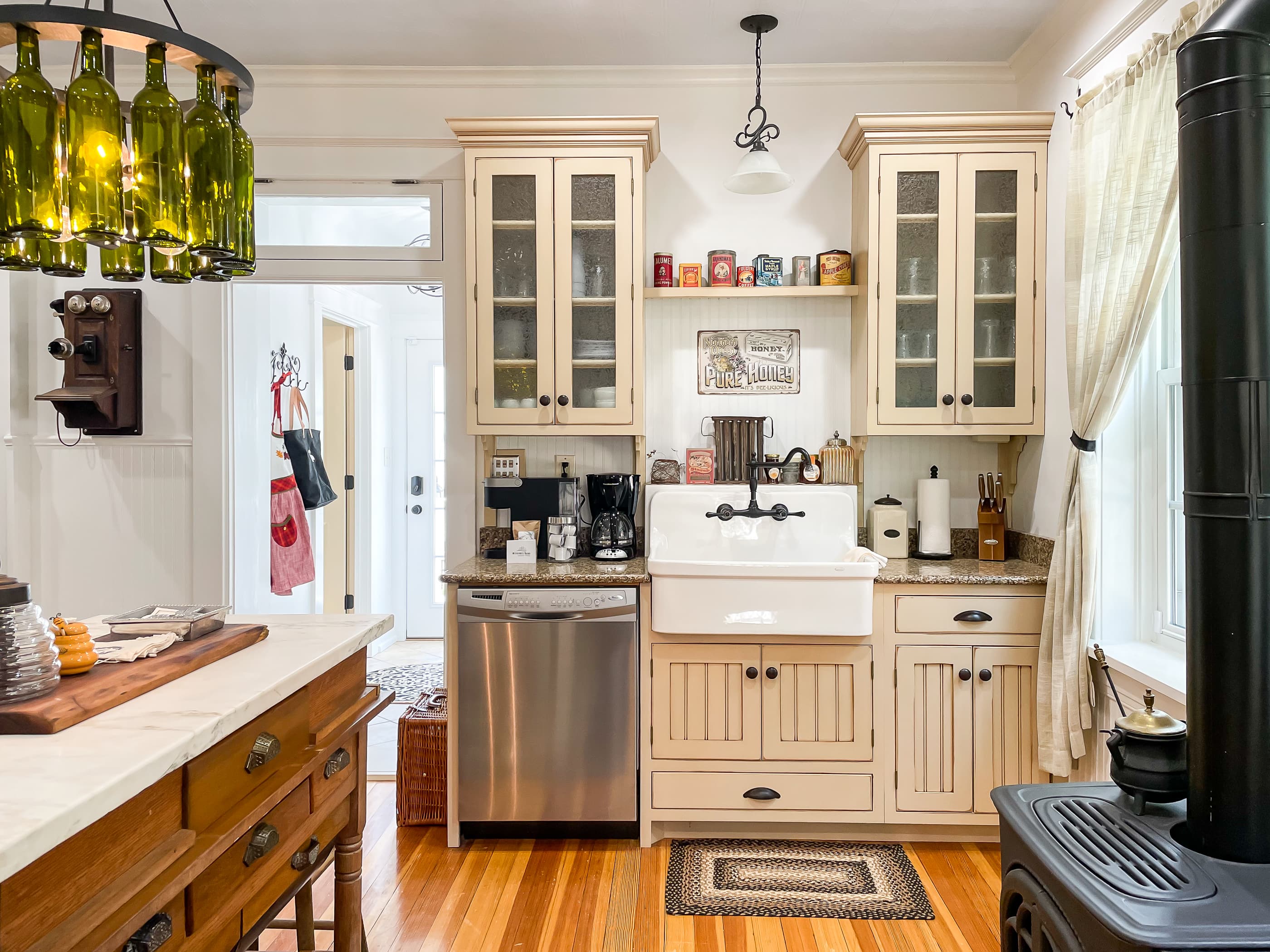 The beautifully detailed full kitchen has everything you need to make your own meals, including place settings, pots and pans, wine glasses, and a regular coffee maker or a Keurig at the Bee's Knees (Beekeeper's Cottage).