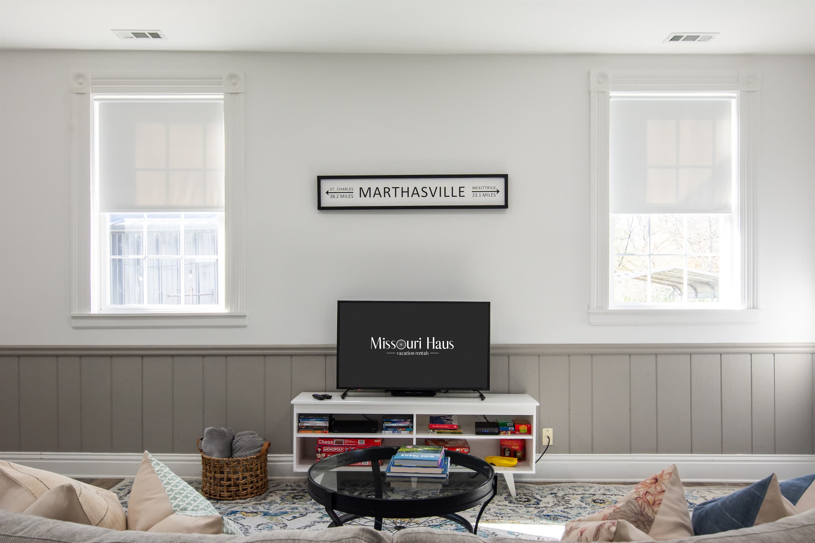 Smart TV and board games for game nights in at the Katy Haus