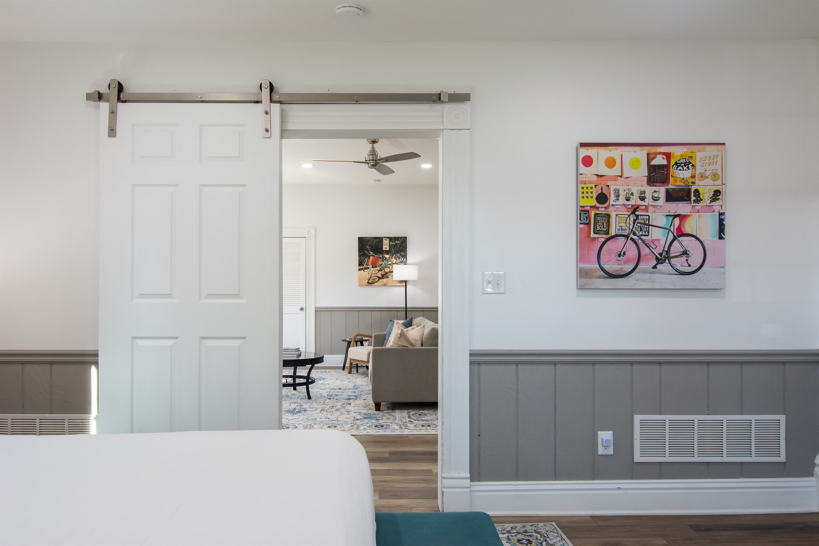 Barn style door between bedroom and main living area at the Katy Haus.