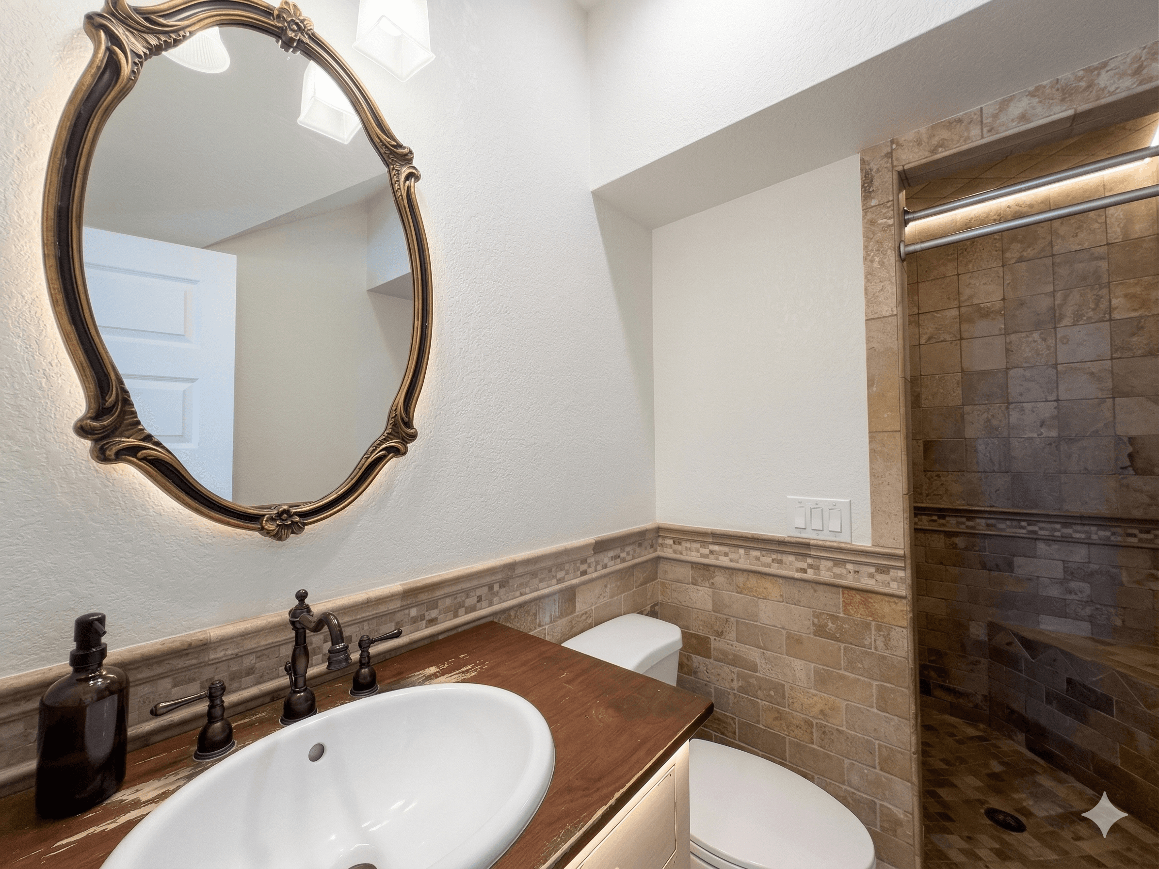 Bathroom 15 — Spa-Inspired Ensuite with Quality Finishes & Tiled Shower | Luxury Amenities at The Mark Twain, Outer Banks