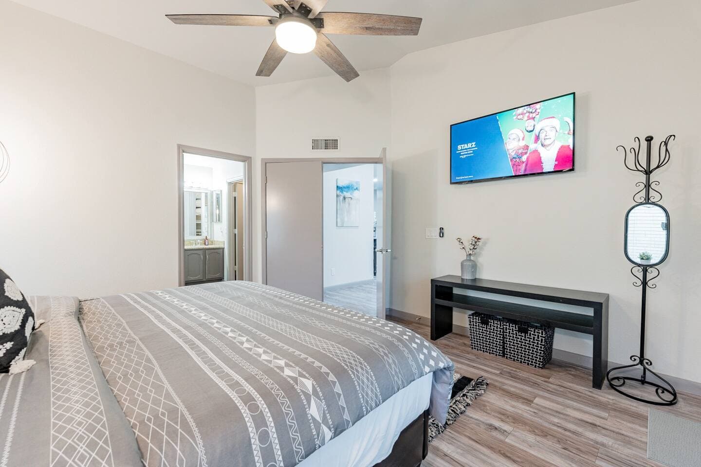 Perfect Staycation - Snuggle up together watching a movie in this beautiful primary bedroom.