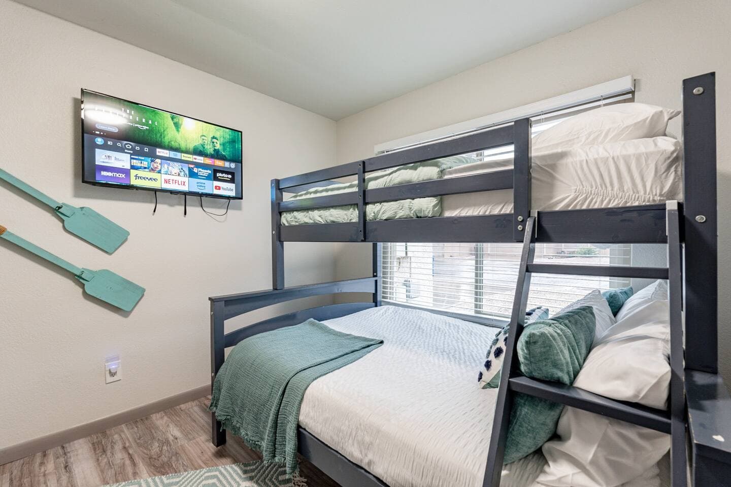 Perfect Staycation - Bedroom 2 with twin over full bunk bed with comfortable, gel mattresses.