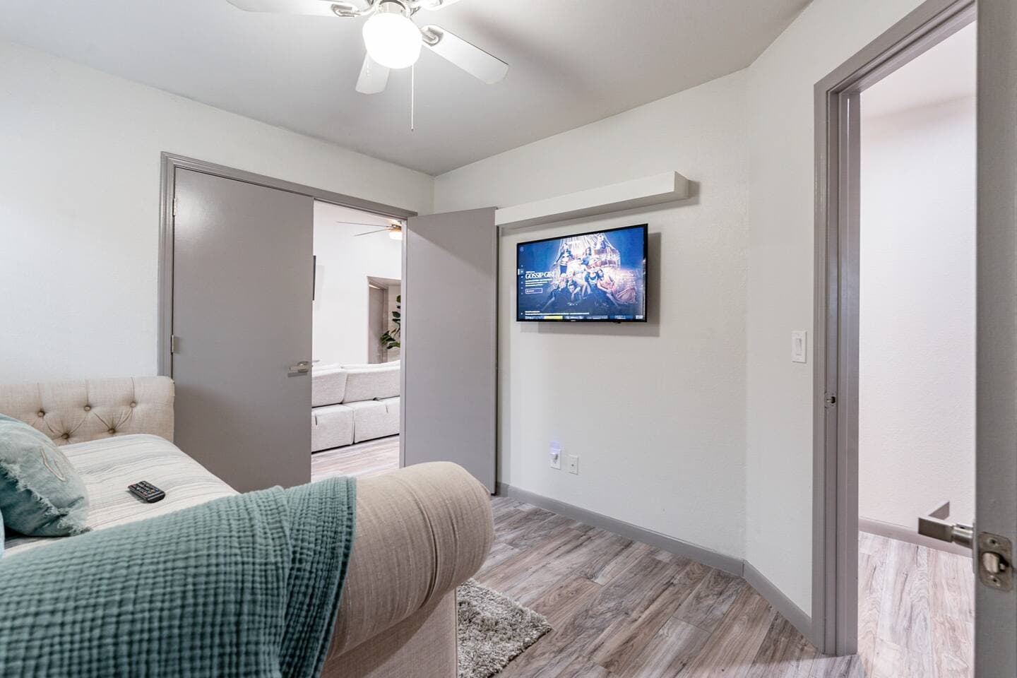 Perfect Staycation - Wall mounted 4k Smart TV and double door entrance for accessibility in the third bedroom.