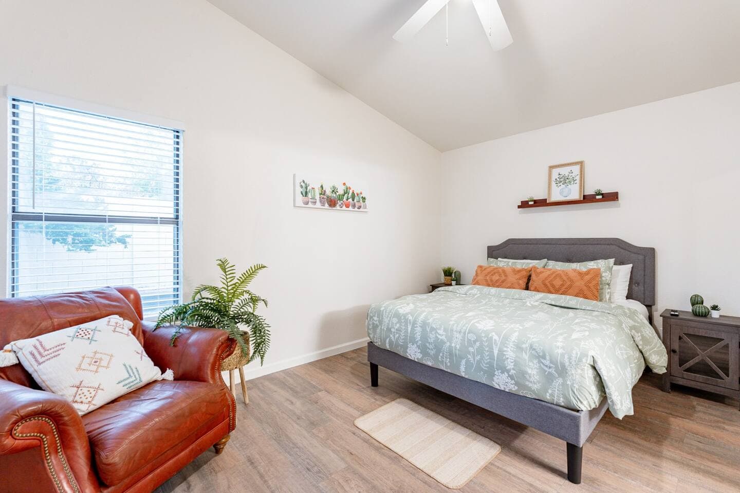 Perfect Escape -primary bedroom with queen size gel foam mattress and reading chair.