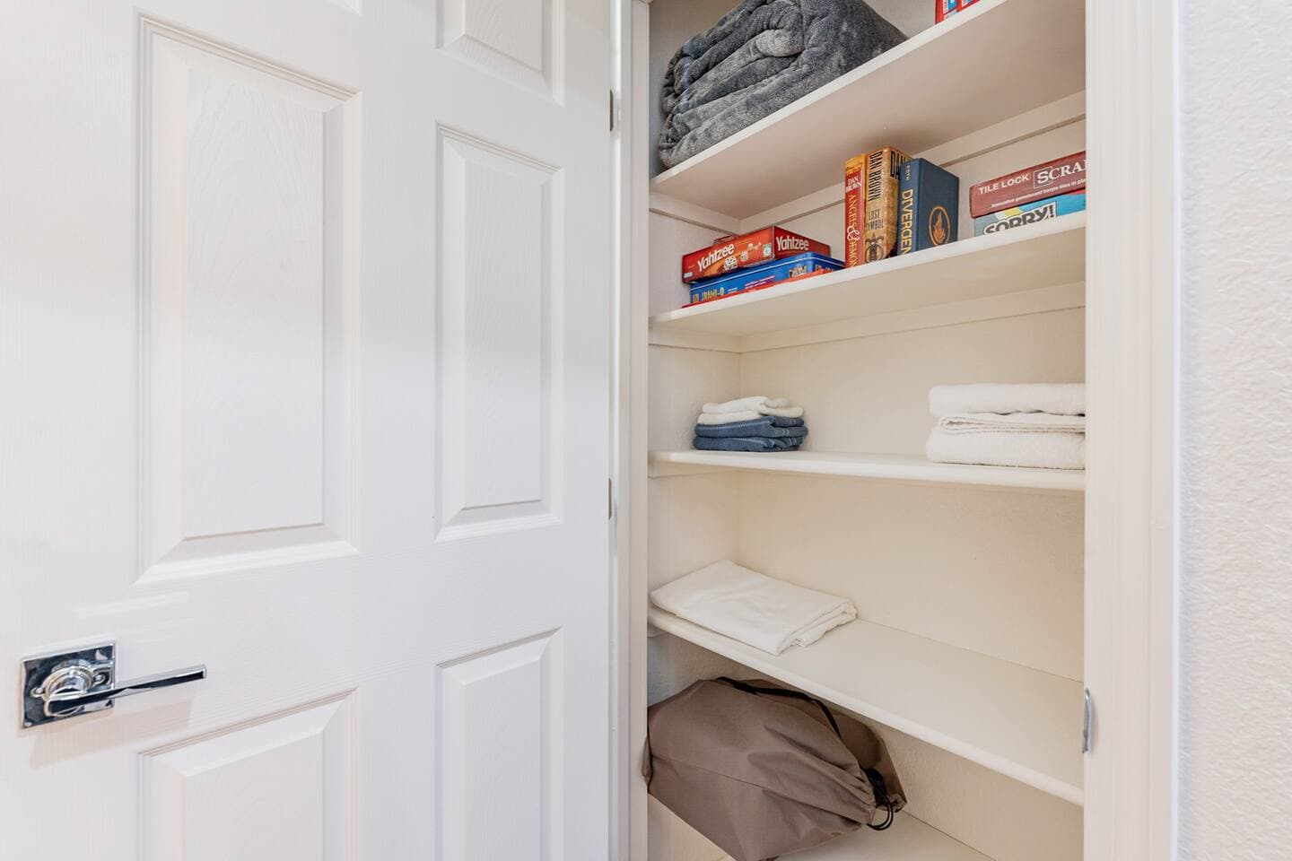 Perfect Escape - The hall closet has extra linens and board games.