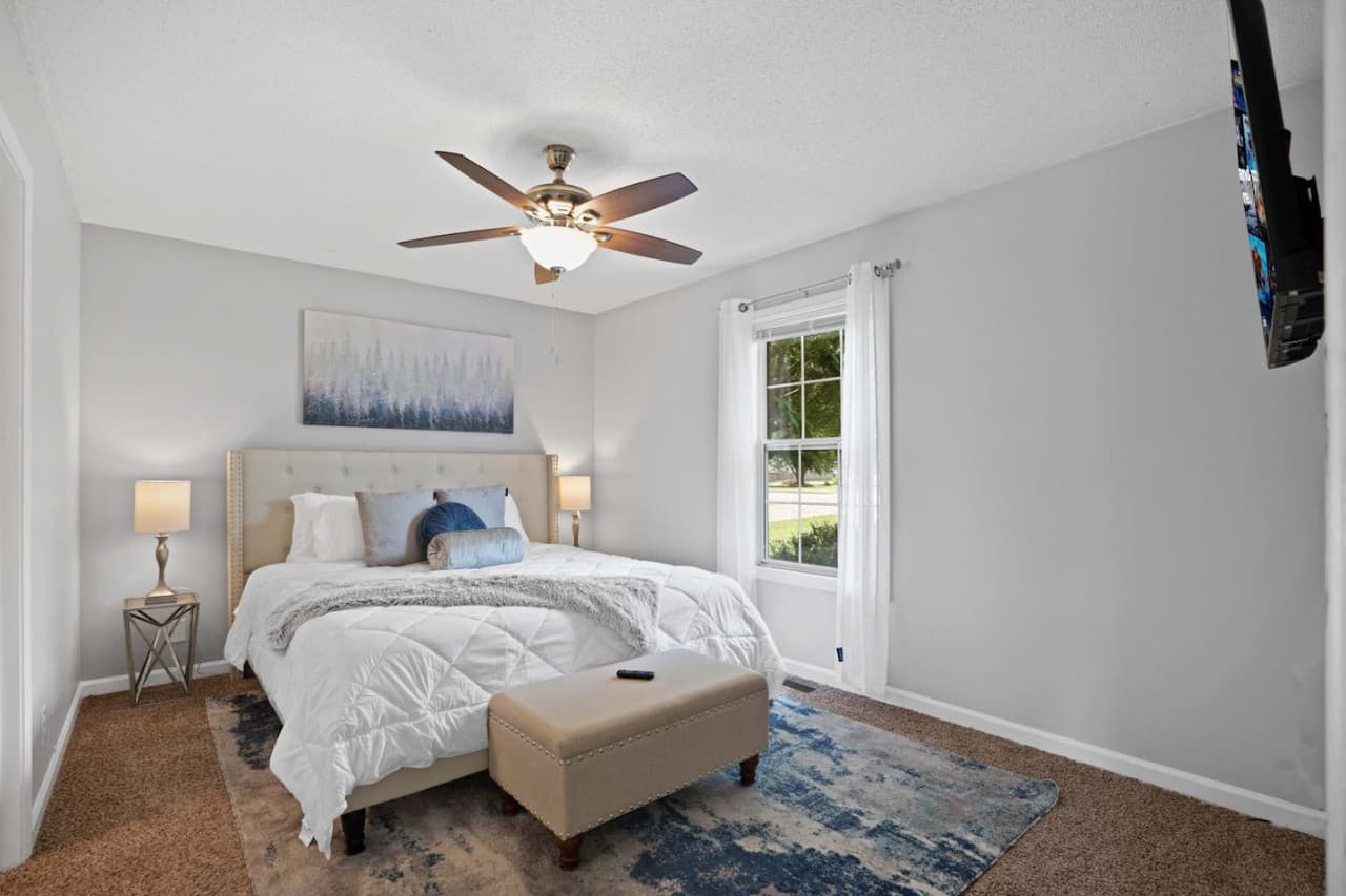 Master bedroom with a king size bed
