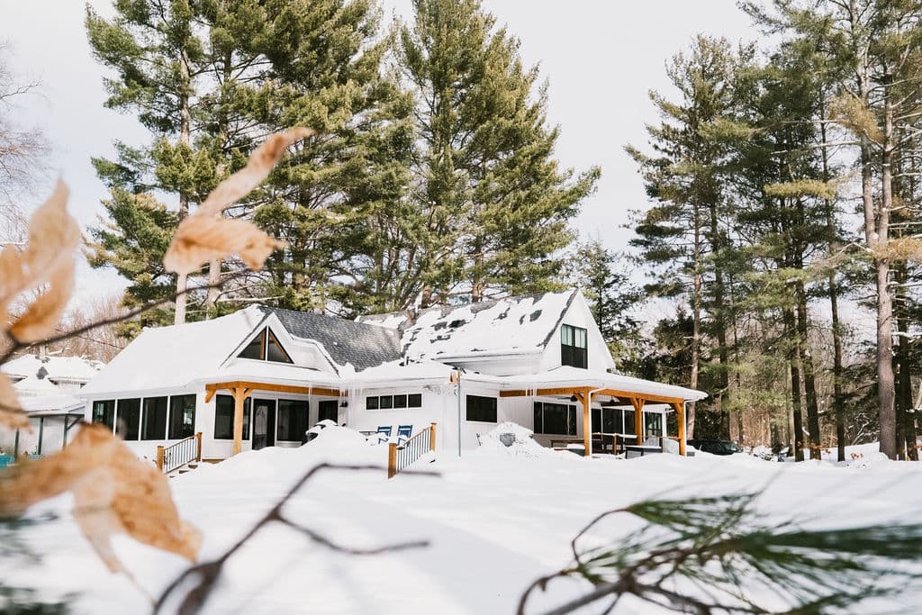 Winter stays: snow-covered lake and cozy indoor spaces