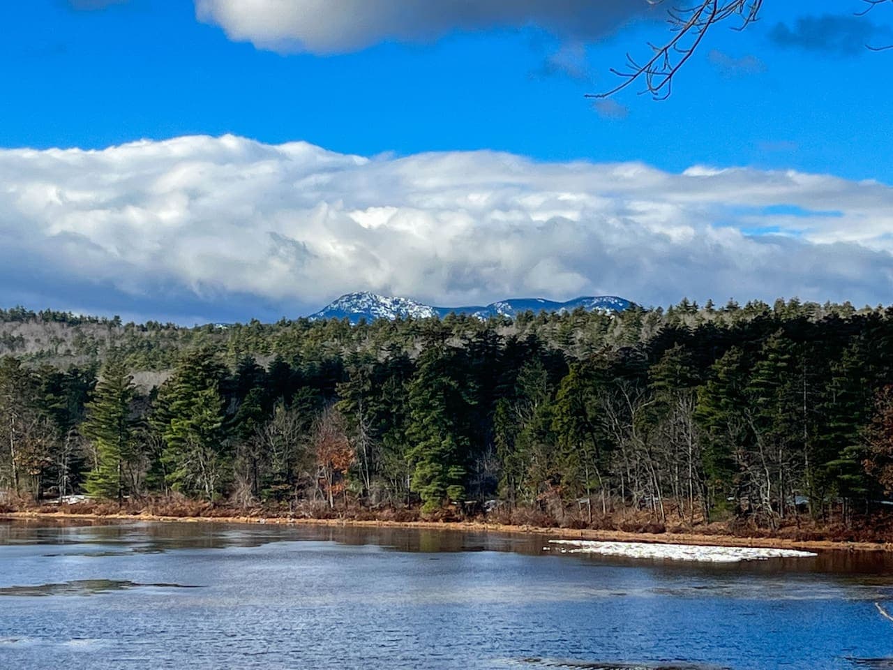 From here, you’re close to the natural beauty that makes this home so special, including unforgettable views of snow-covered Mount Chocorua and the peaceful waterfront just outside your door.
