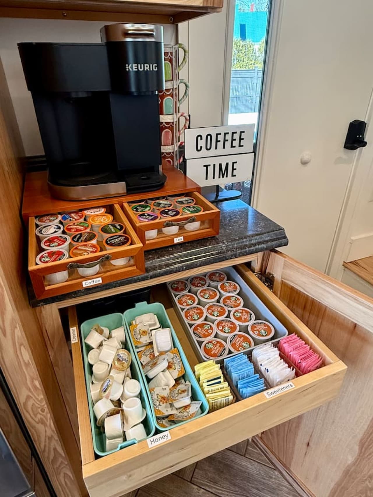 Your easy morning ritual: coffee, tea, and cocoa with sweeteners + shelf-stable cream ready to go. No store run—just sip, breathe, and enjoy the view.