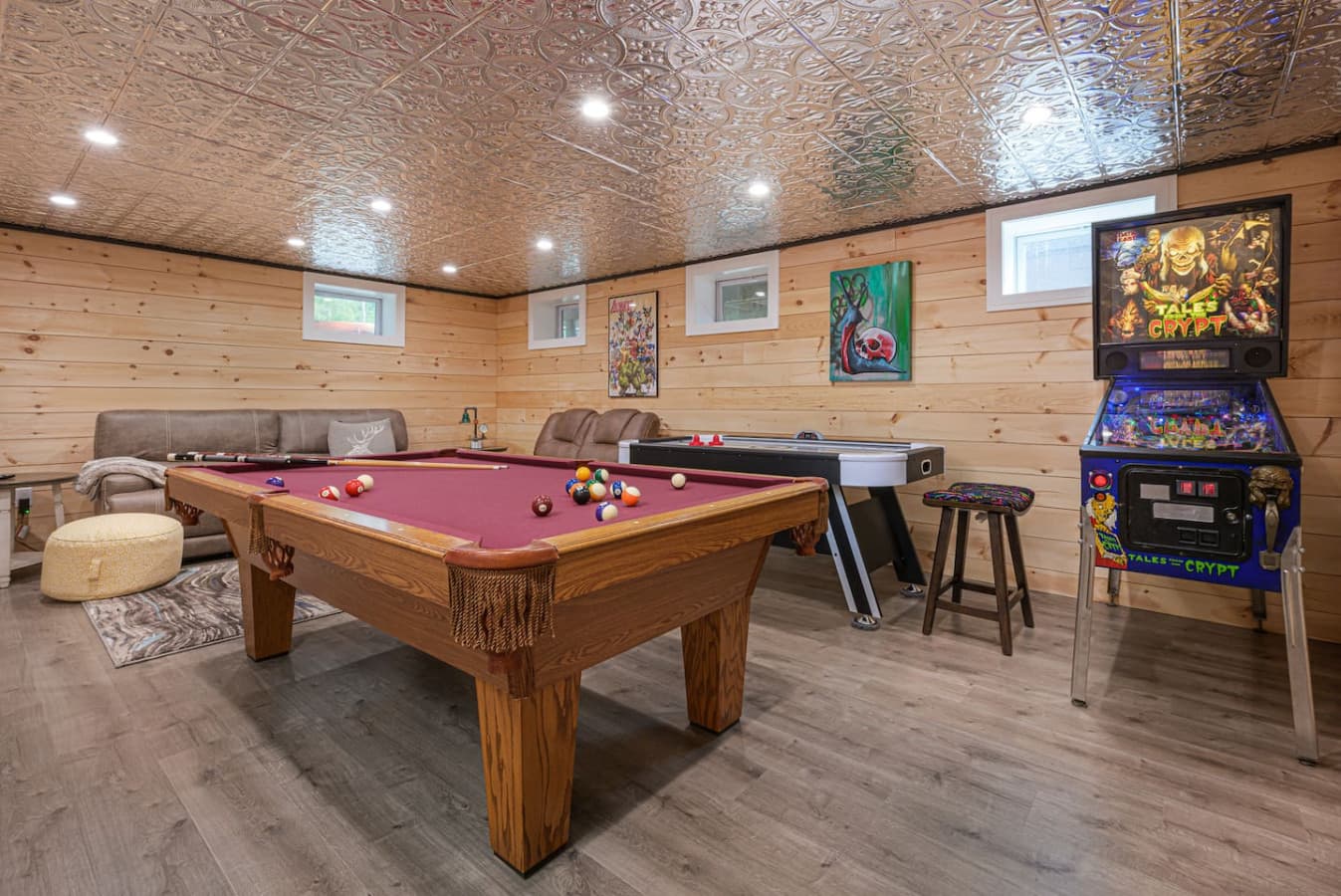 Our spacious game room is your private entertainment hub, with pool, air hockey, vintage pinball, and a cozy movie lounge for laid-back nights, family fun, and friendly competition all in one place.