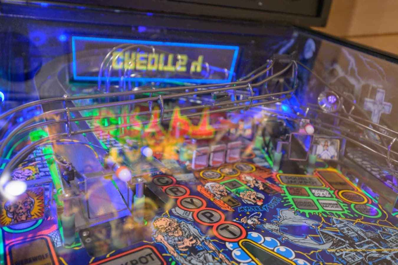 A vintage coin-operated Tales from the Crypt pinball machine adds a nostalgic arcade feel, with flashing lights, classic sounds, and just the right dose of retro fun. *Spooky pinball theme may not be suitable for all guests*
