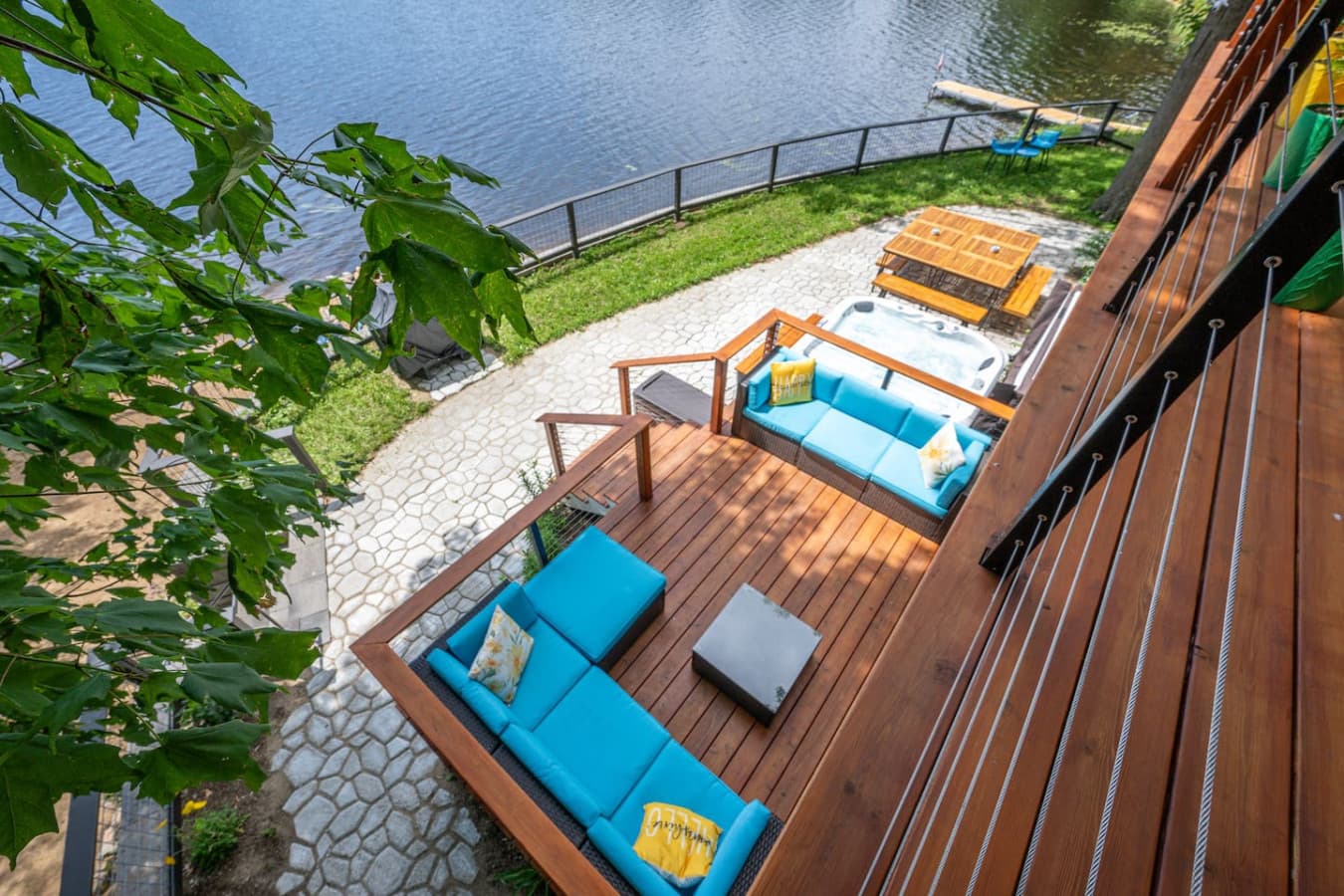 Step onto the second-floor balcony for panoramic views of the water, Mount Chocorua, and patio below. It’s a beautiful spot for morning coffee, glowing sunsets, or watching a summer storm roll in.