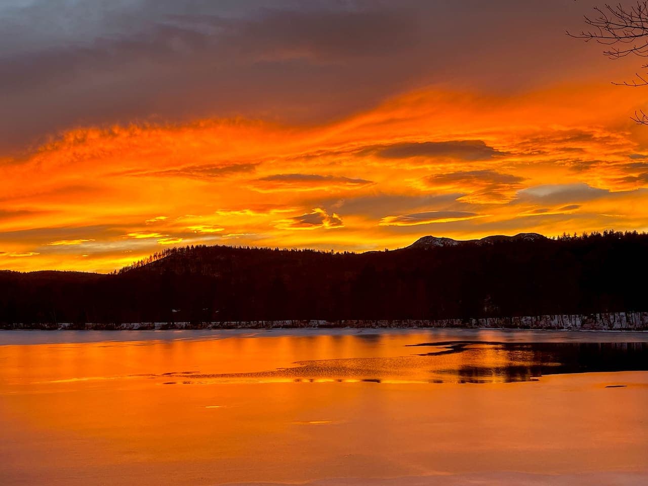 Just outside, the private porch offers peaceful sunset views—the perfect way to end the day after time on the water.