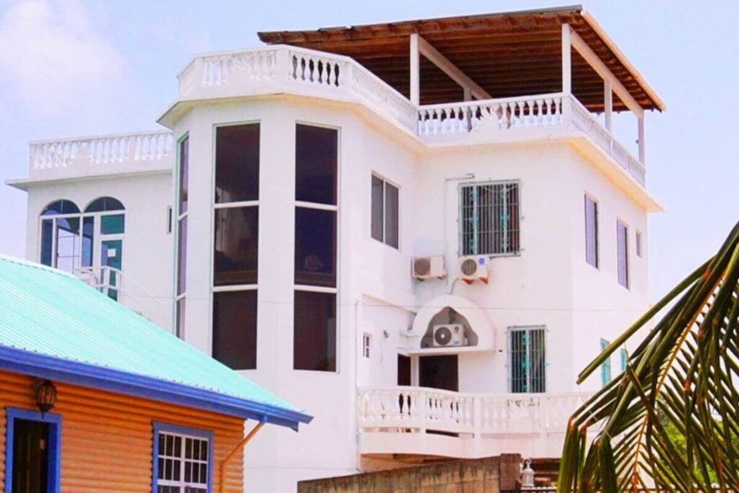 Relax in this spacious, ground floor, Sea View studio located within this stylish Sea View waterside villa overlooking the breathtaking Caribbean Sea and lush mangrove forest!