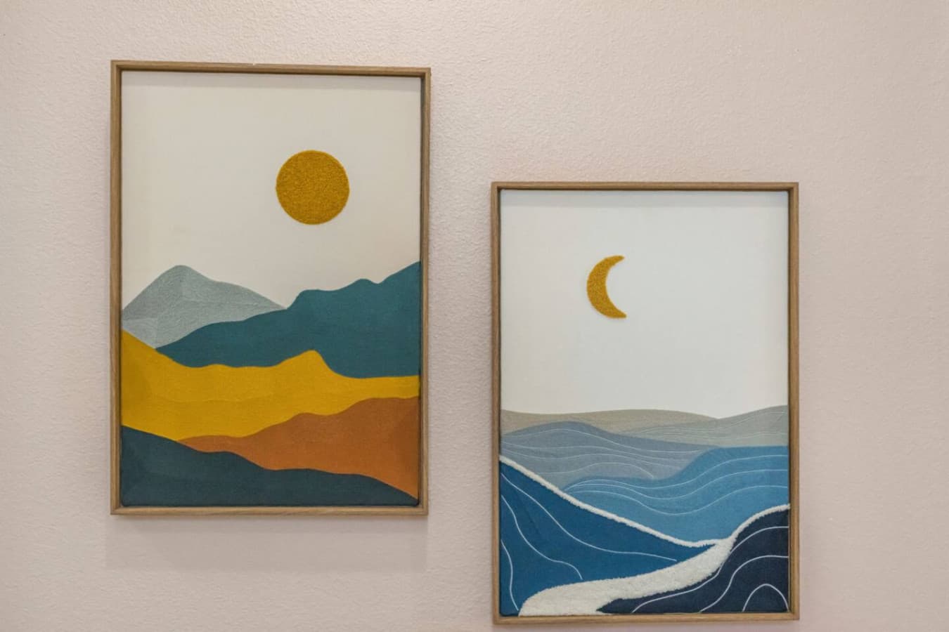 Framed artwork adding soft color and a calm, coastal-inspired feel indoors.