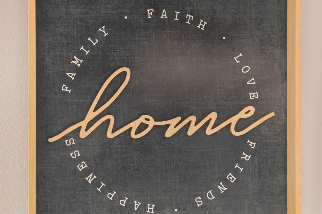 “Home” wall accent that adds charm and a personal touch to the decor.