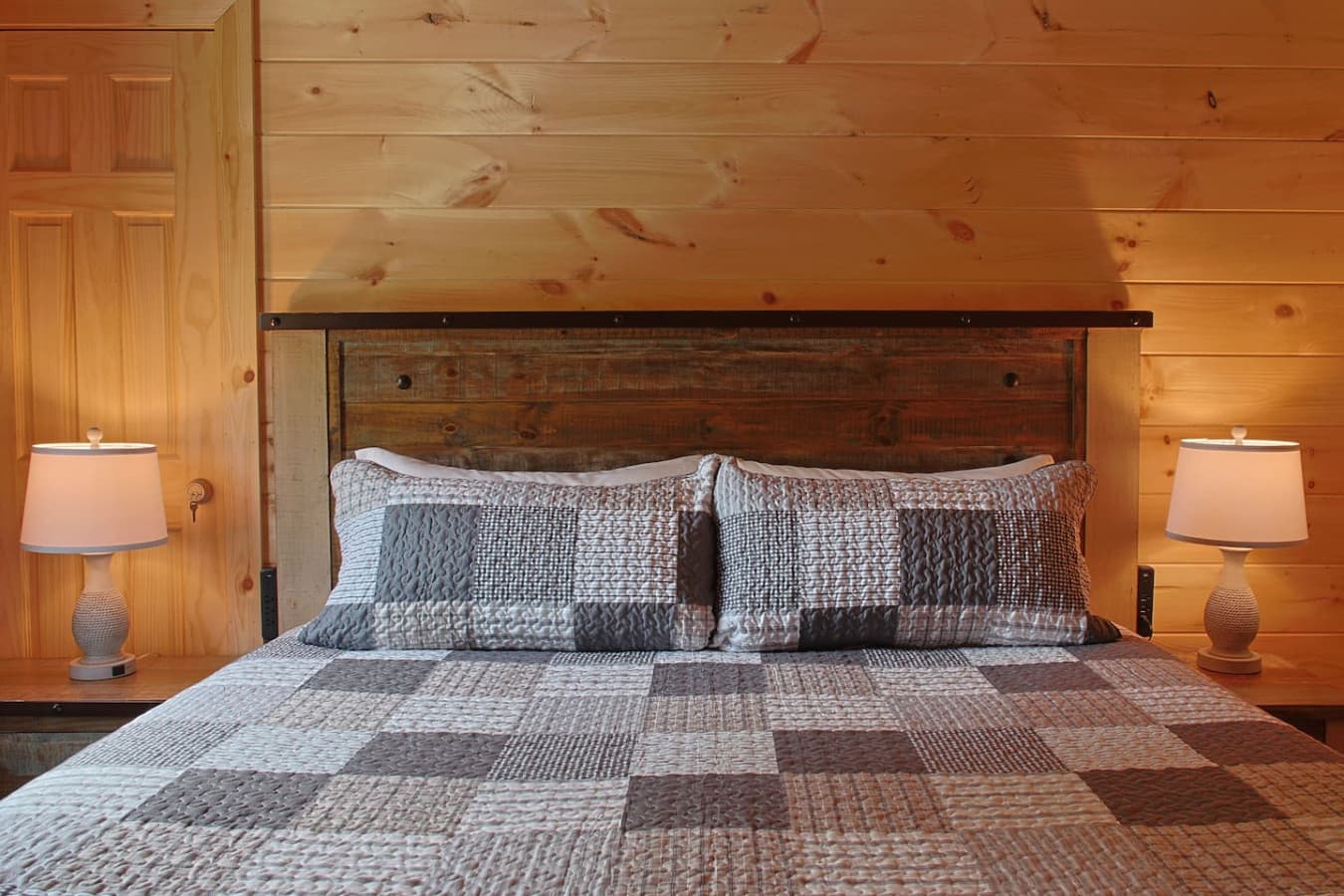 King-Sized Luxury: Stretch out and relax in style with high-end bedding and a sweeping view of the valley.